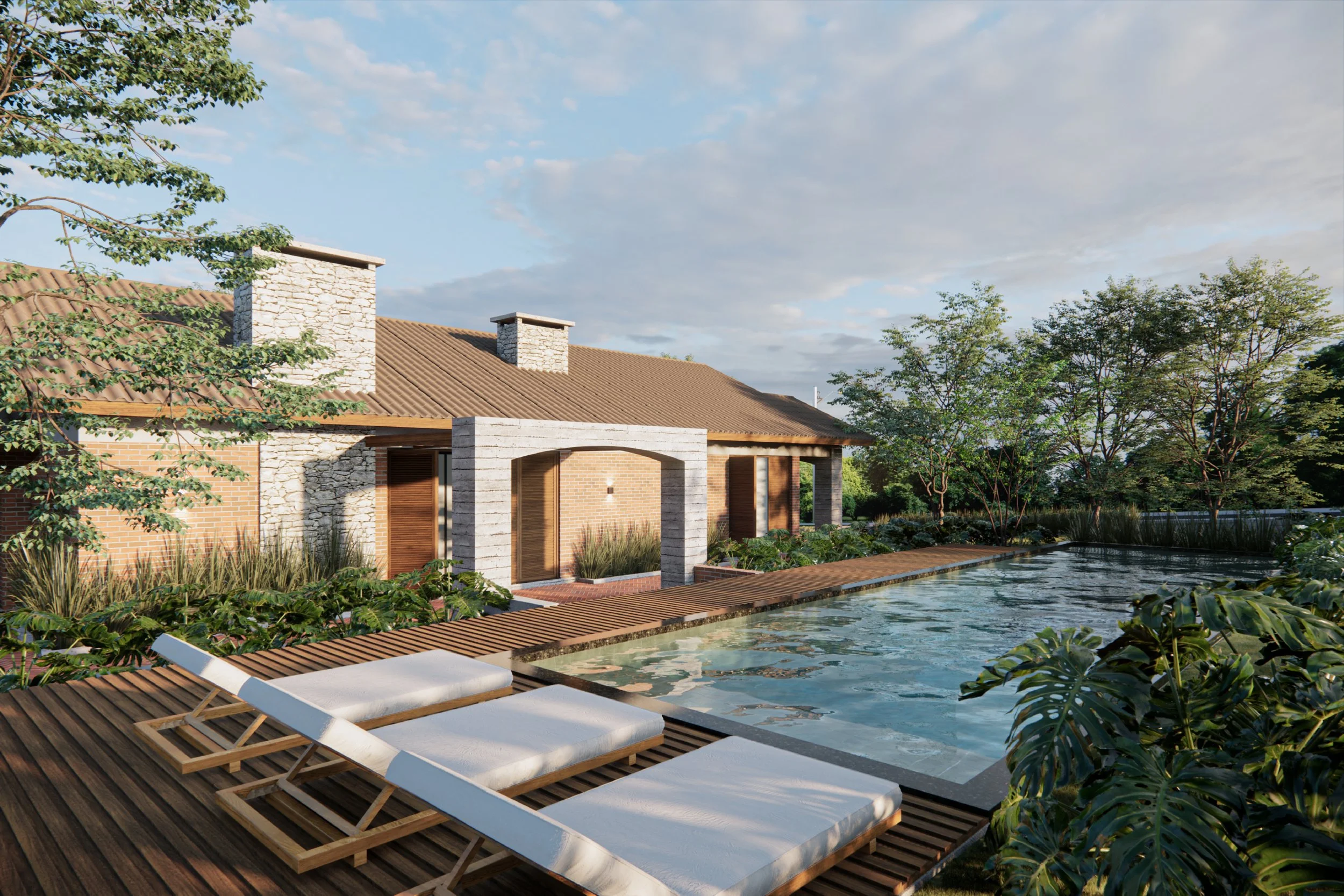 Casa de campo com piscina, espreguiçadeiras de madeira com almofadas brancas, jardim com árvores e plantas ao redor.