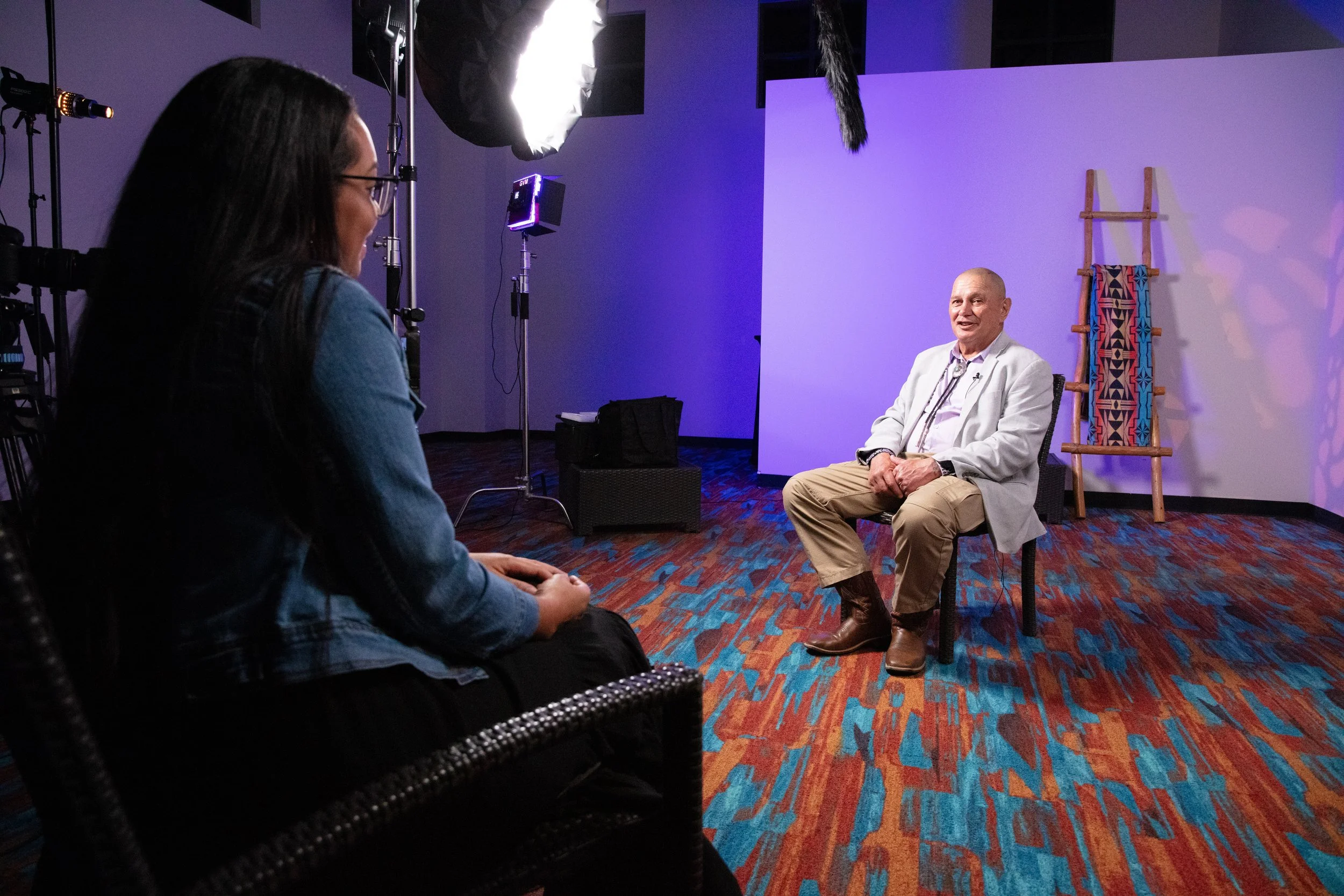 Willow Blythe-Carroll conducting a video interview for a client conference
