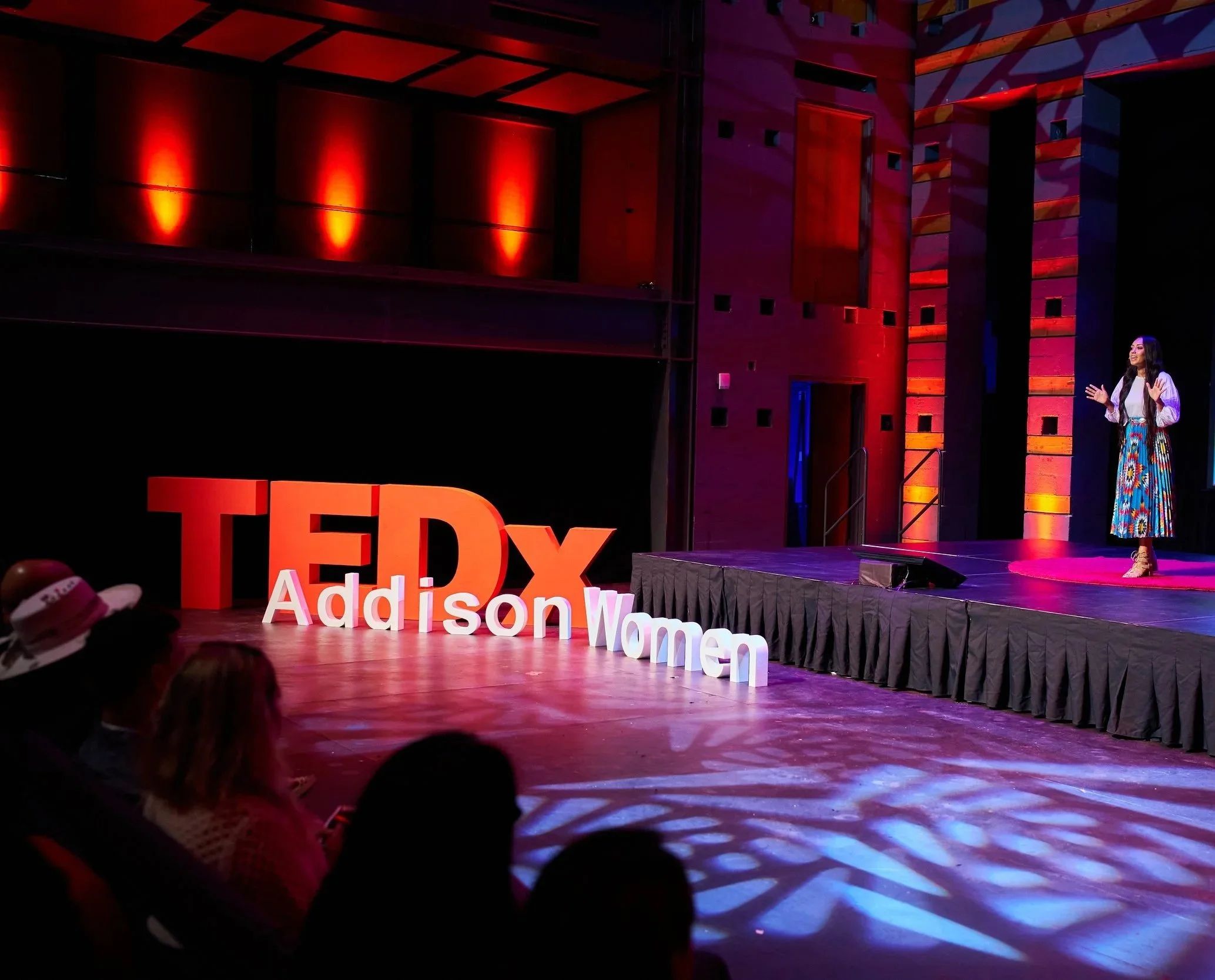 Willow Blythe-Carroll on stage at TEDxAddison Women