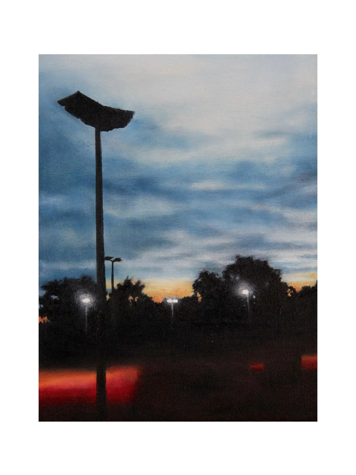 A sunset sky with shades of blue and orange, silhouettes of trees and streetlights, and a dark street with a tall hill with a streetlamp on top.