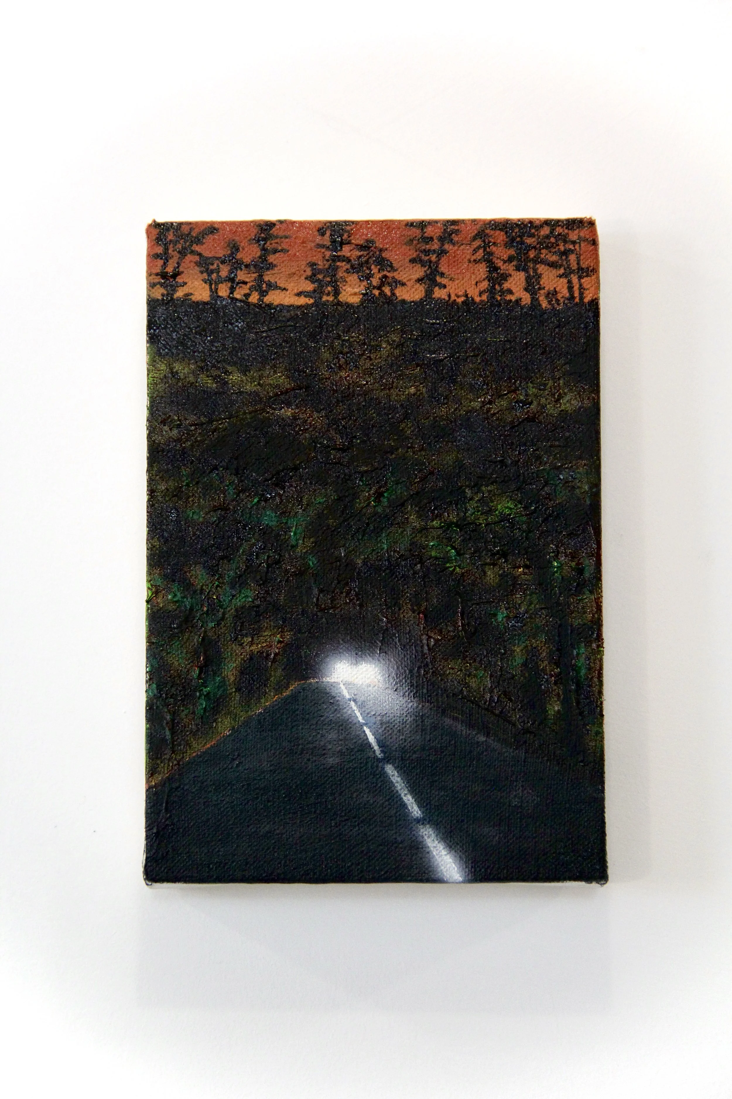A painting of a sunset over a forest with dark trees, a road leading into the distance, and a reflective sky with orange hues.