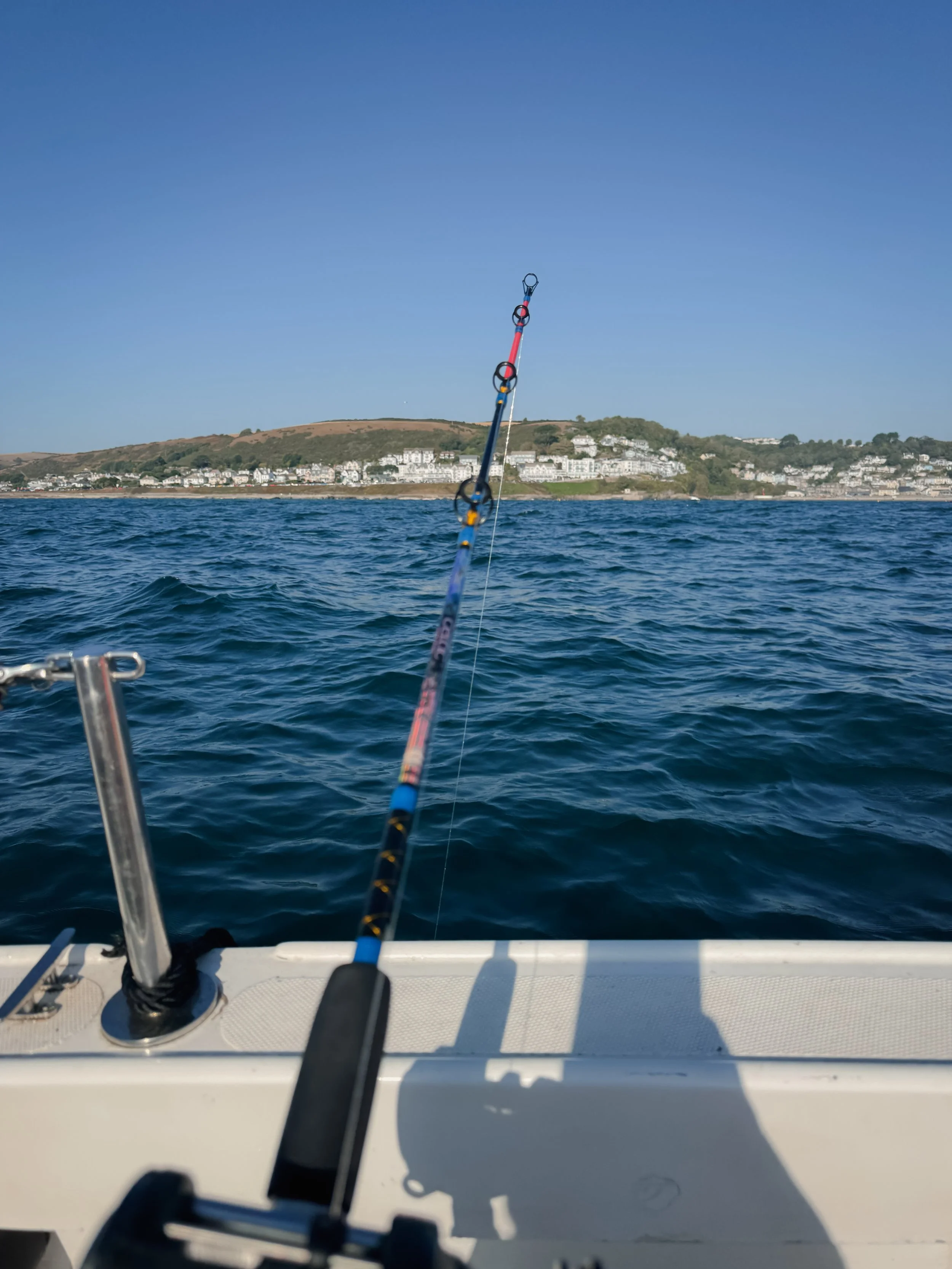 Fishing mackerel in a boat in Cornwall