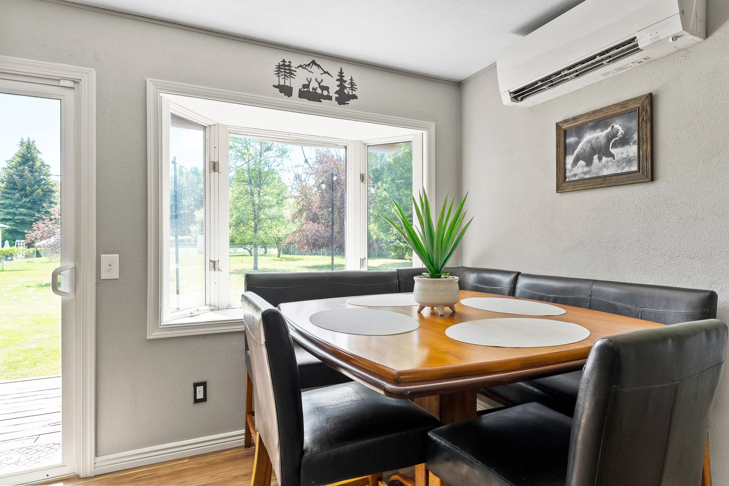 Dining nook with backyard views — perfect for morning coffee