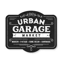 Black and white sign reading 'Urban Garage Market' with additional text about vintage and handmade items.