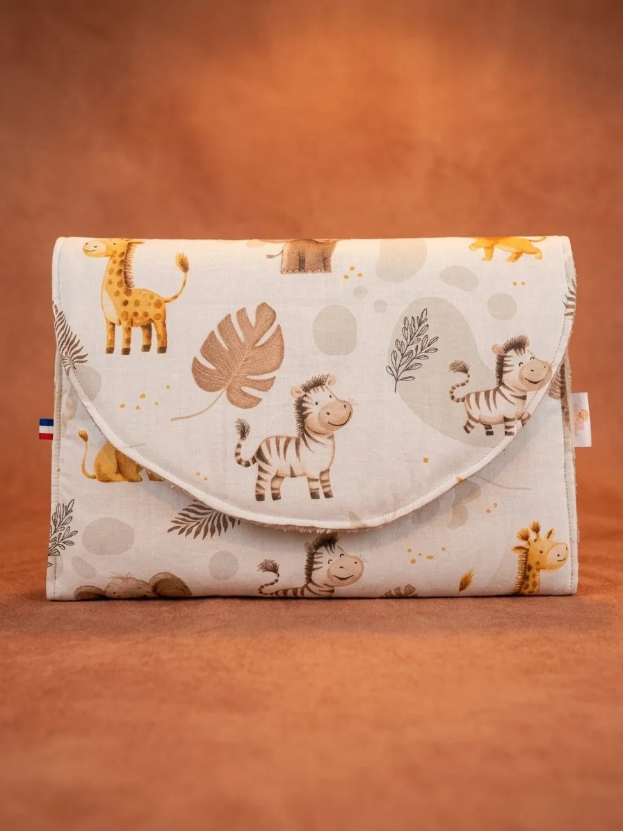 Tapis à langer nomade matelassé pour bébé