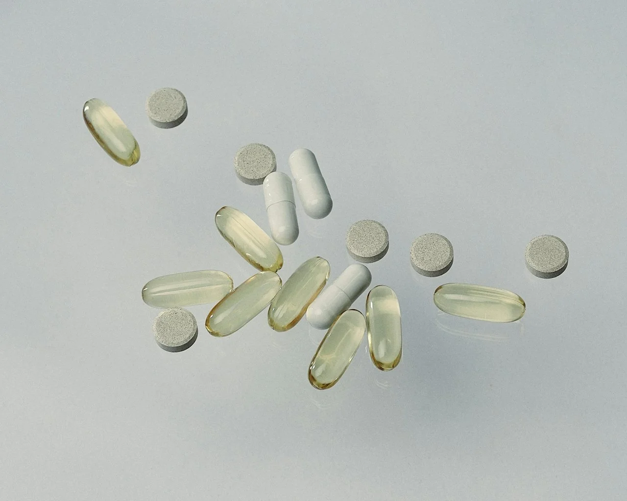 Assorted wellness supplement capsules — evidence-driven treatments from FORM by GBY