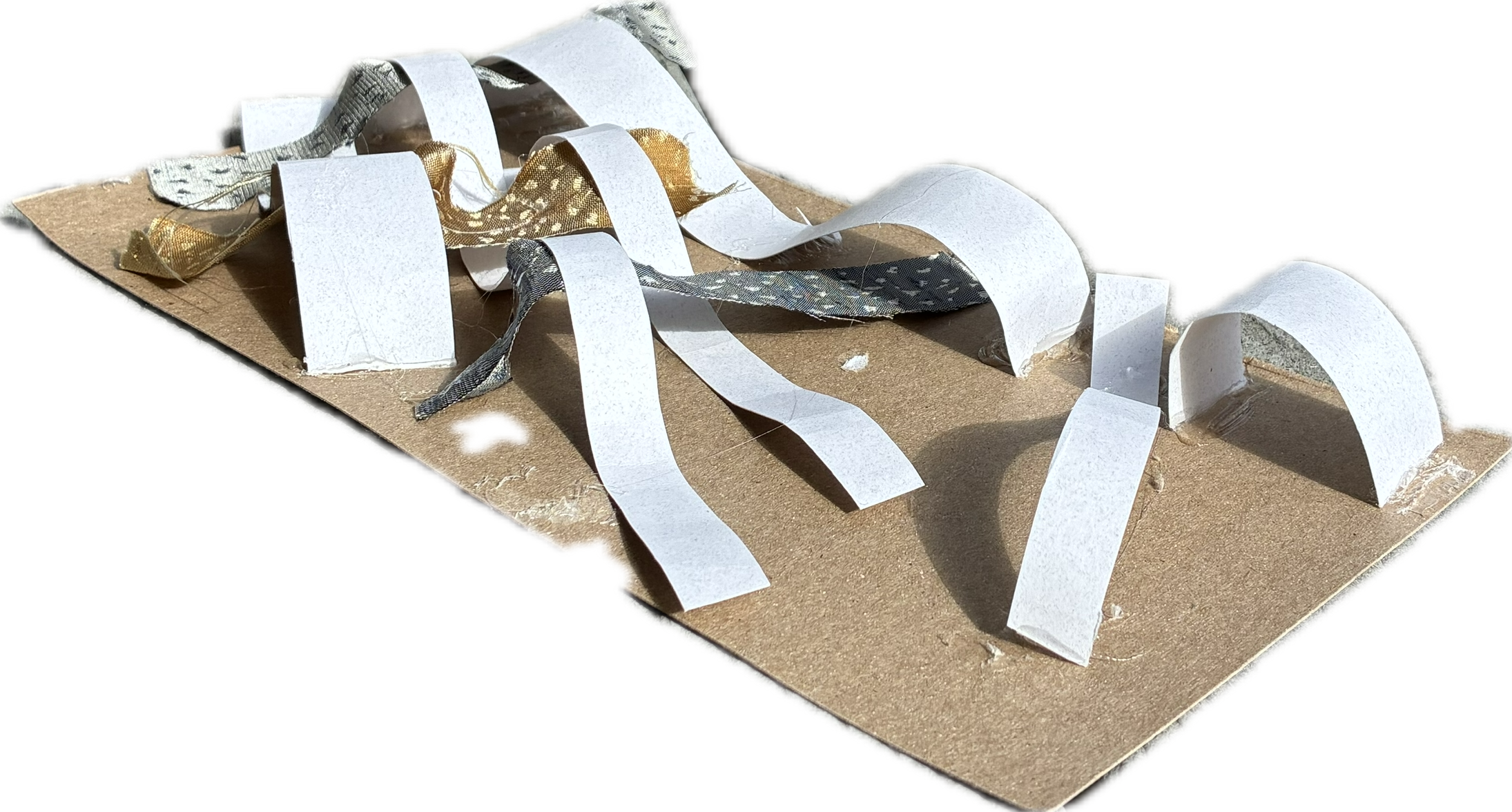 This sketch model uses both strips of paper and strips of fabric to explore weaving as a sculptural form