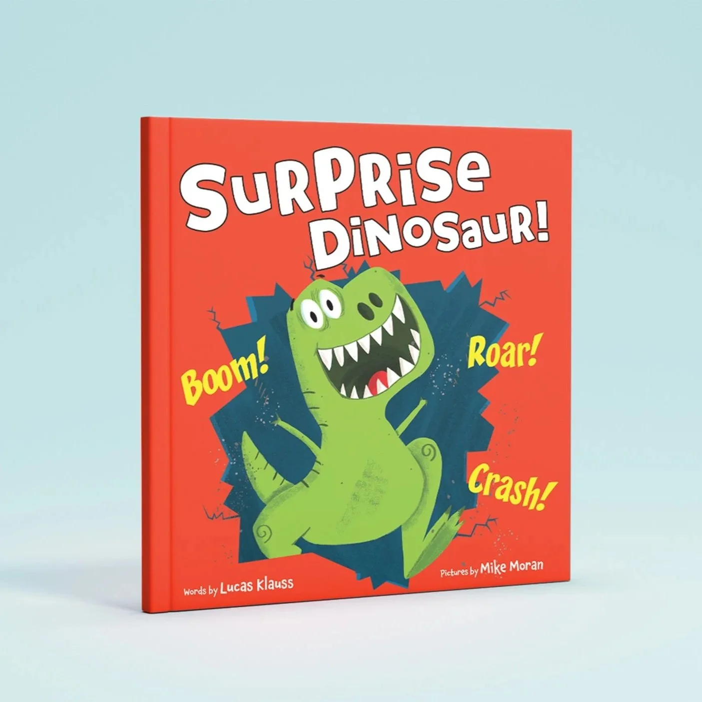 Colorful children's book titled "Surprise Dinosaur!" with a cartoon green dinosaur bursting through a blue background, surrounded by words like 'Boom!', 'Roar!', and 'Crash!'.