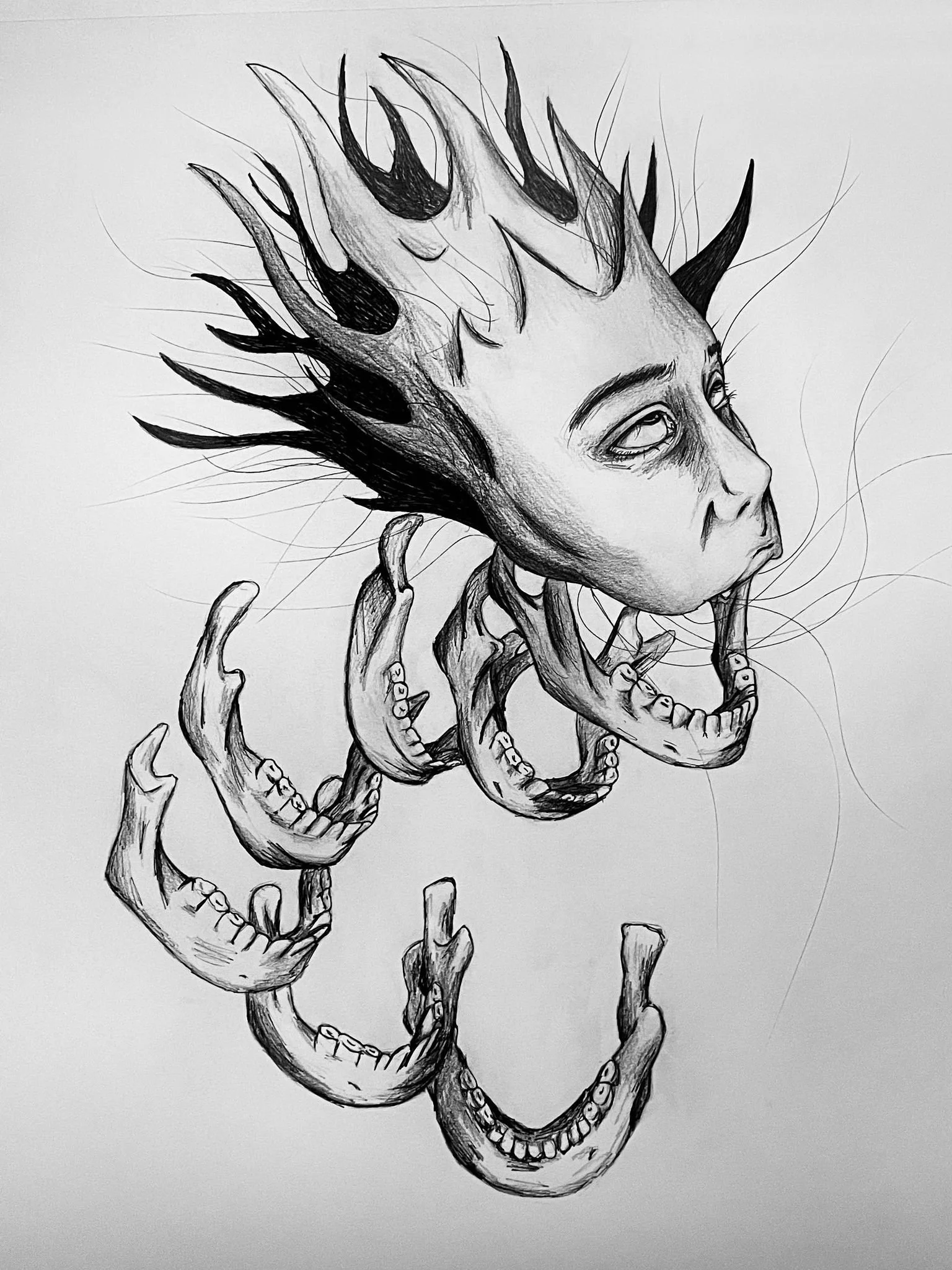 Black and white illustration of a person's face with a skull and antler-like structures emerging from the head, surrounded by skeletal hands.