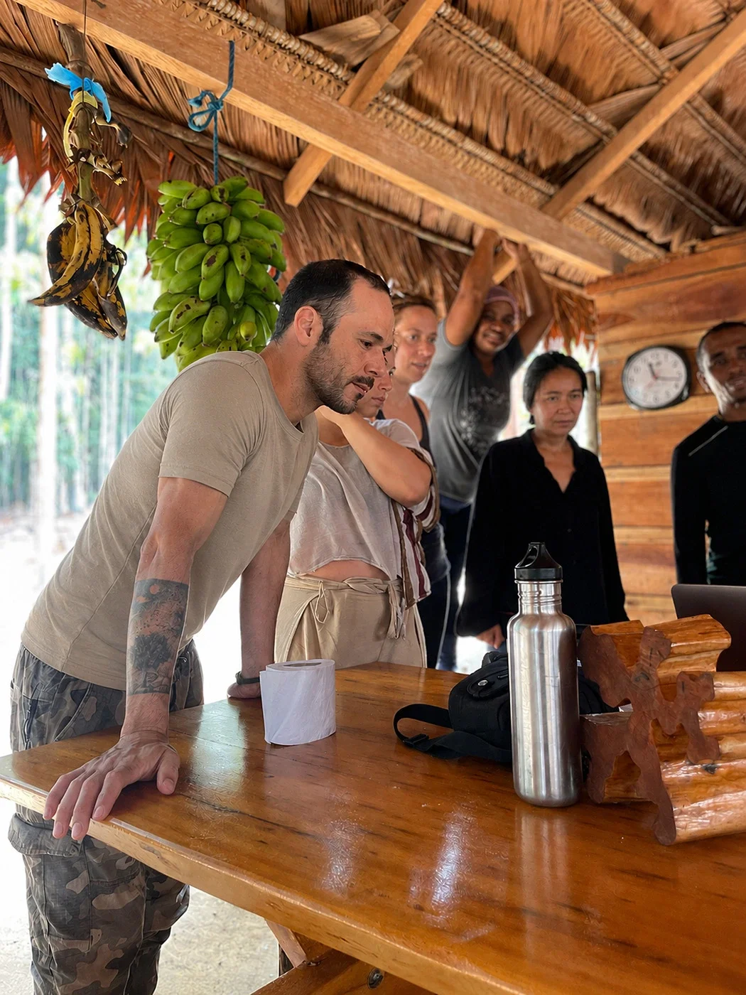 Travellers sharing experiences and reflections during a regenerative tourism journey in the Brazilian Amazon.
