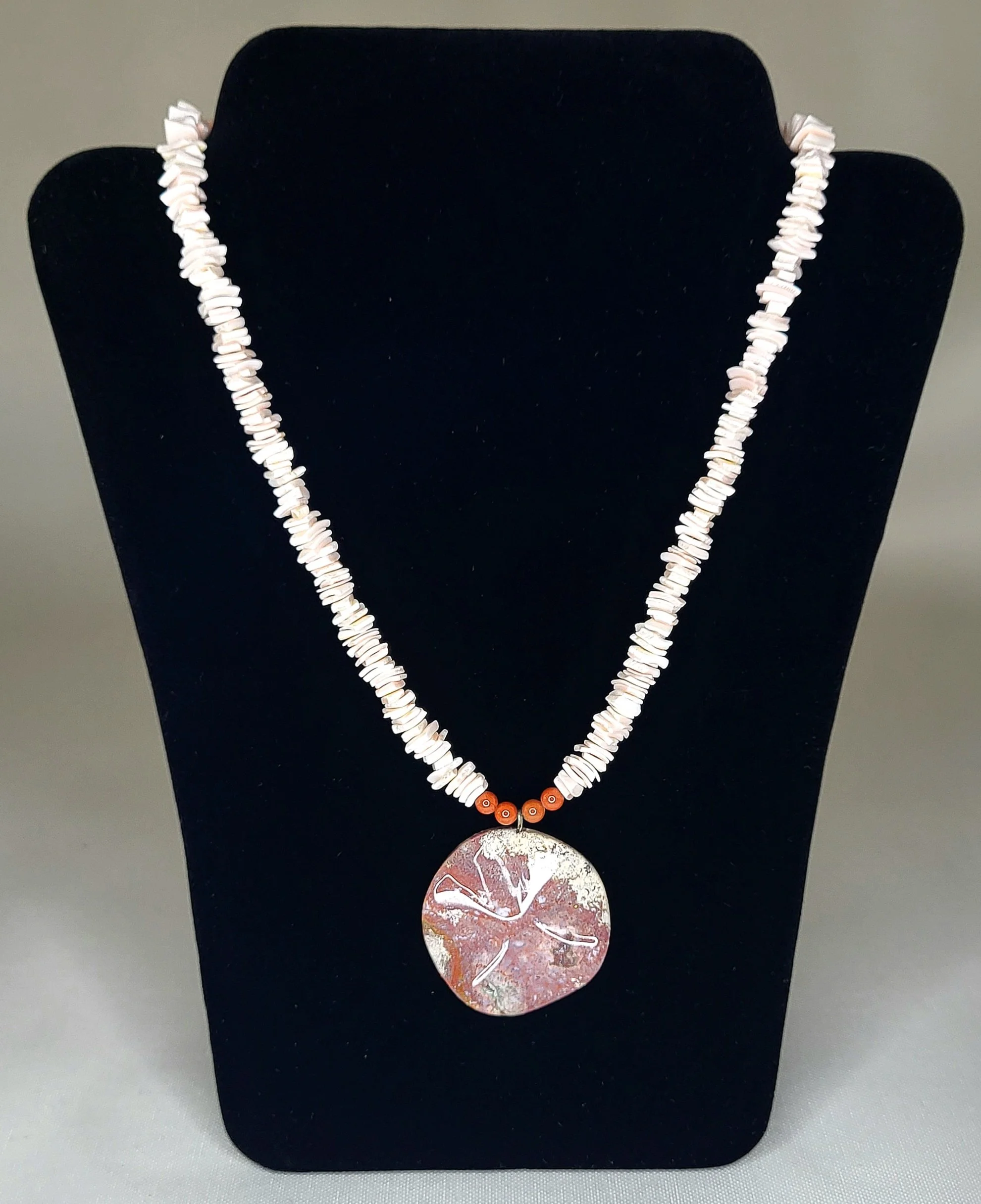 Coastal Elegance Puka Shell Necklace with Sand Dollar Pendant