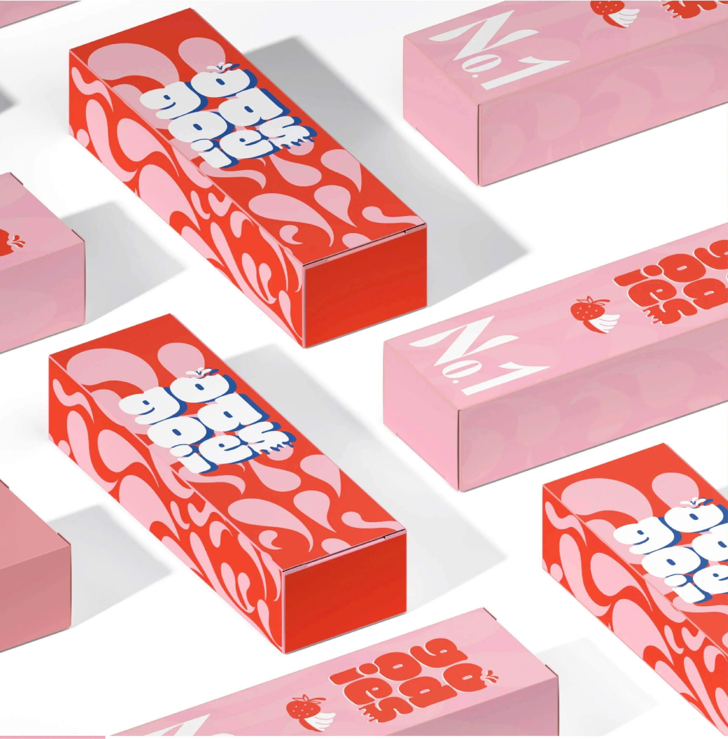 Multiple pink and red boxes with strawberry and floral designs, featuring bold white and red text reading 'hello summer'.