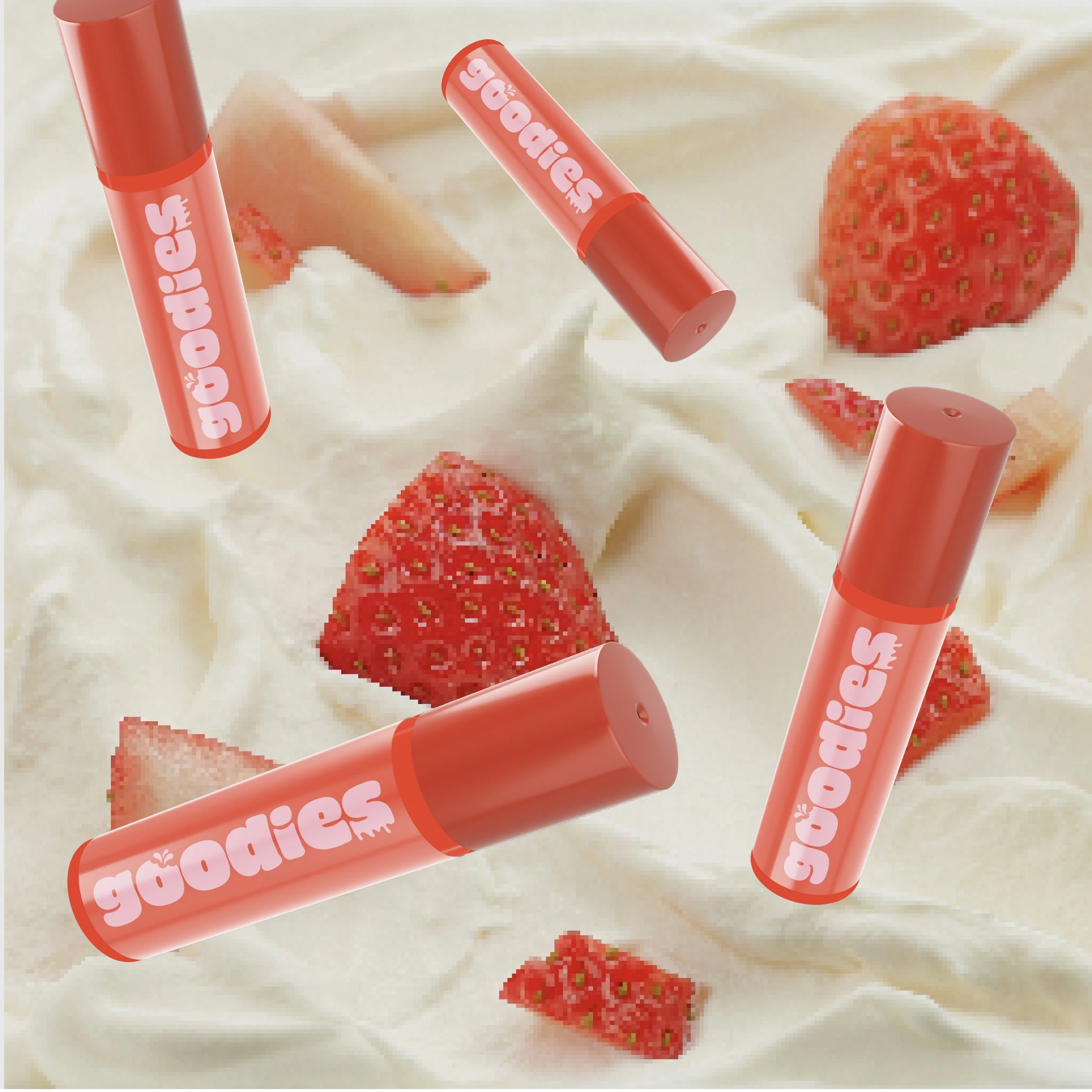 Multiple red lip gloss tubes with the word 'goodies' written in white on them, and plate of sliced strawberries on a cream-colored fabric background.