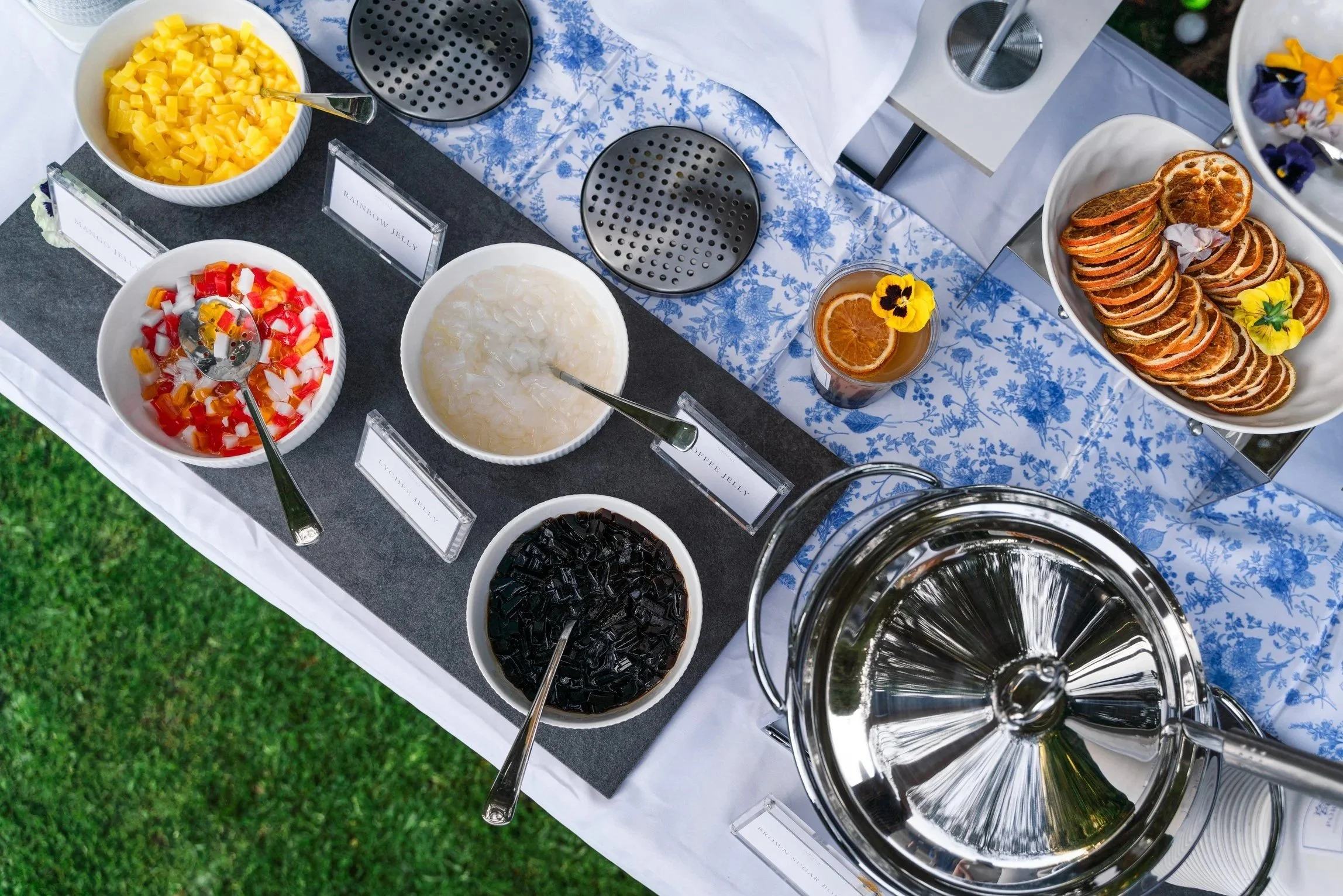Luxury boba catering setup with tea, toppings, and styled event service.