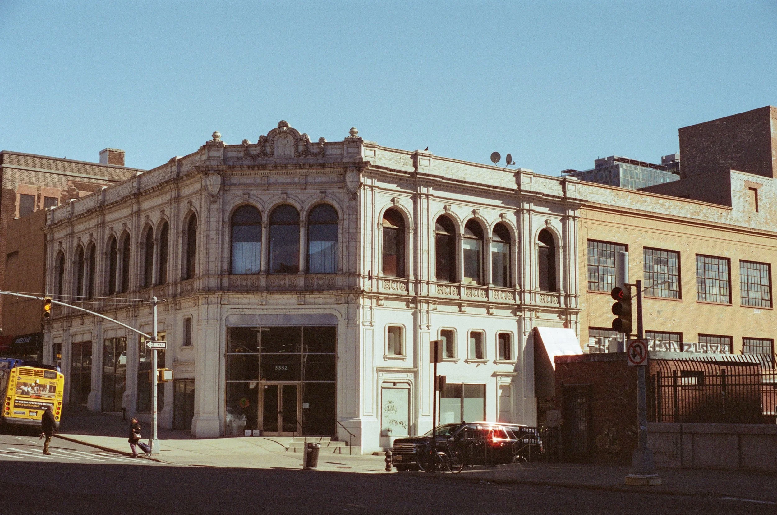 Analog photograph of an old building in upper Manhattan, showcasing the photographer's eye for composition and an attention to color details.