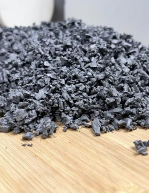 Rubber chippings on a wooden surface.
