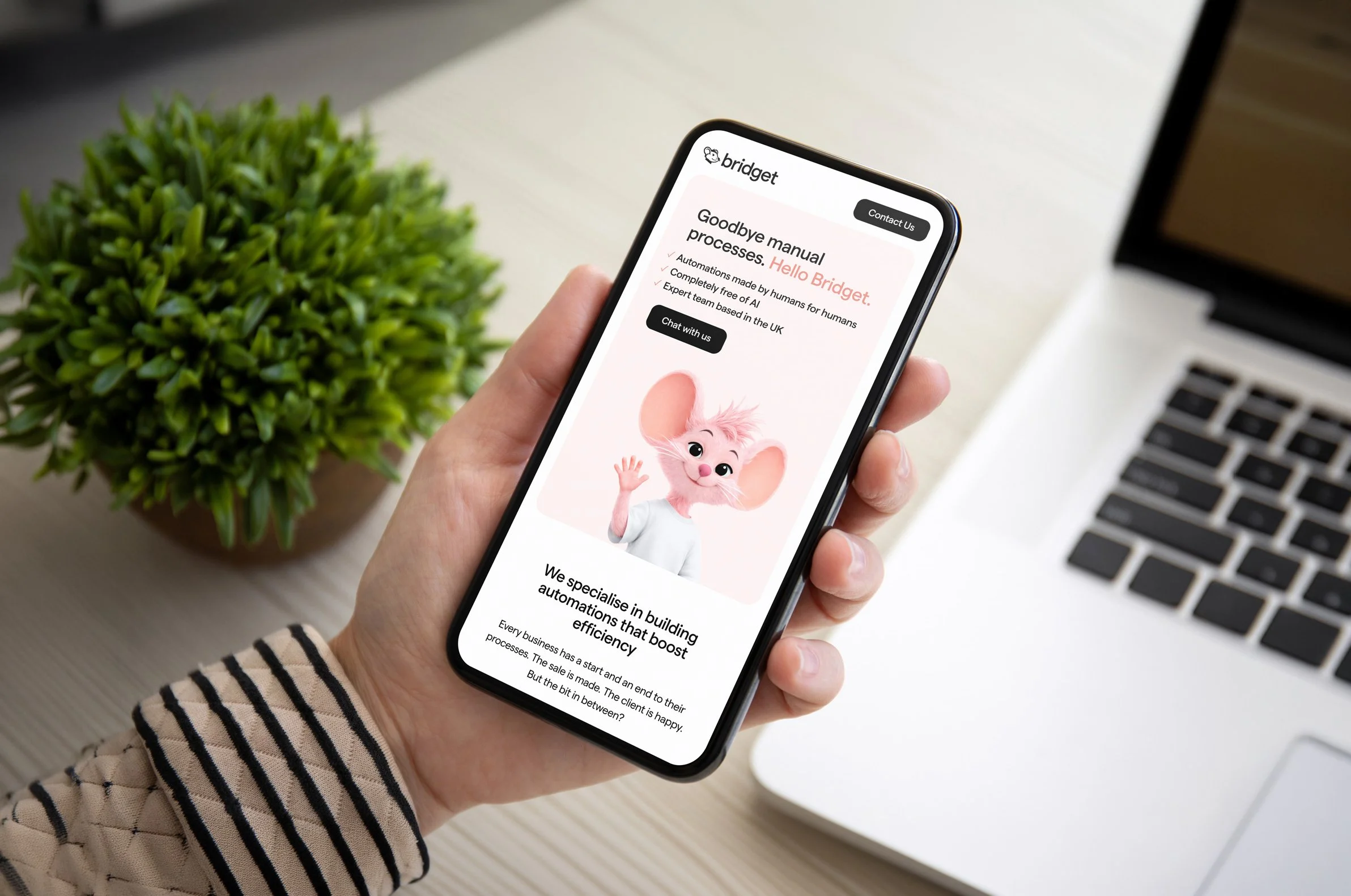Hand-Holding-Phone-Concept-Mockup.jpg
