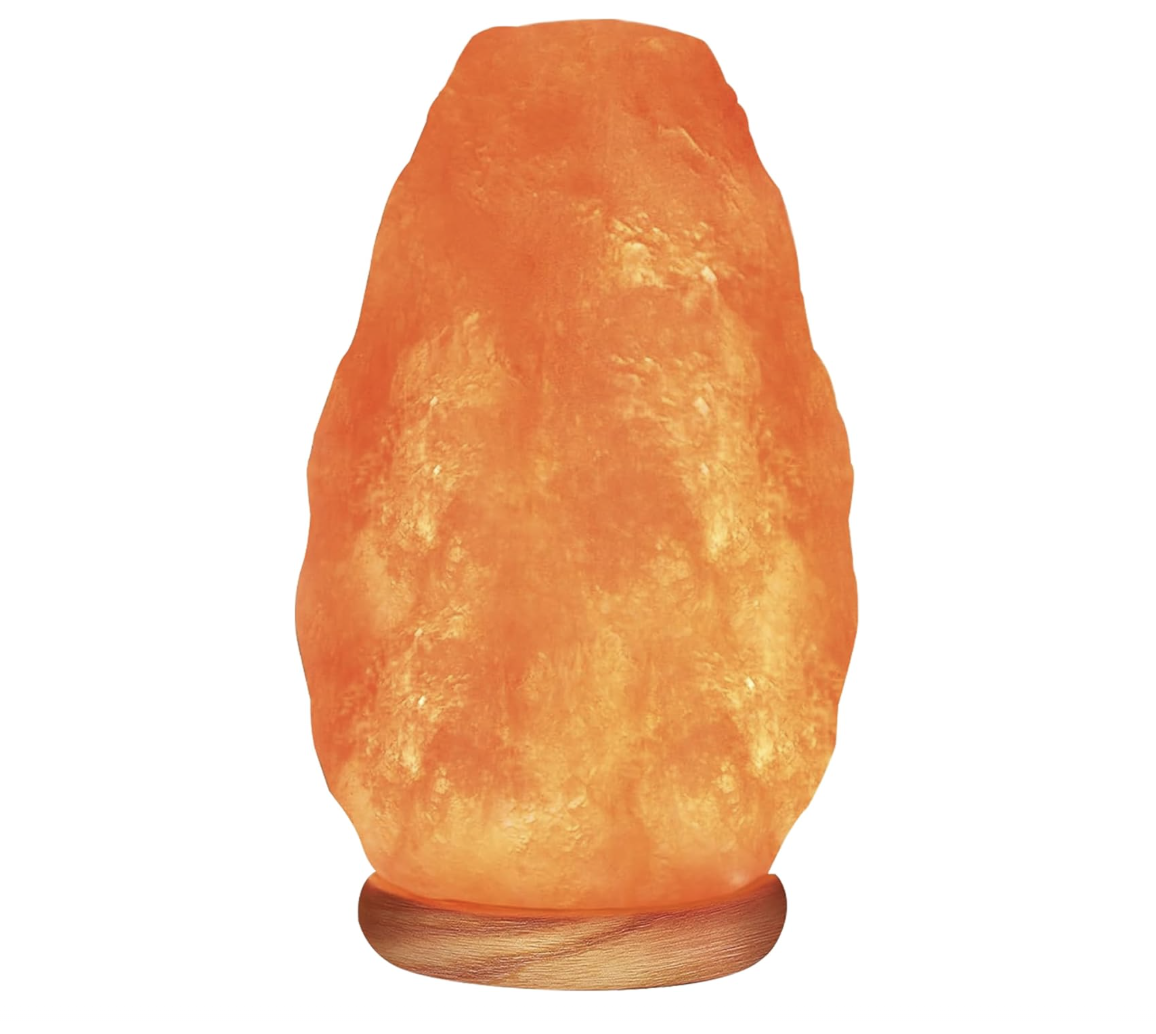 Himalayan salt lamp with a wooden base, emitting a warm orange glow.