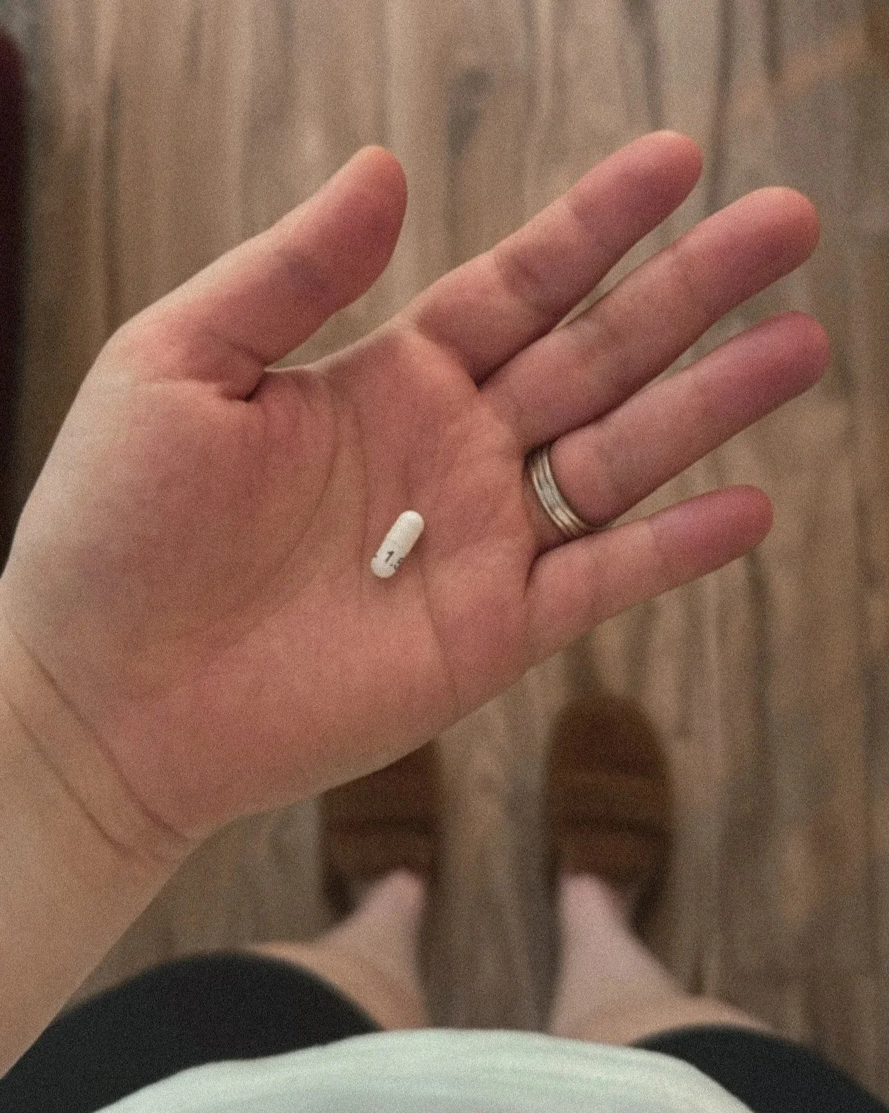 hand holding mood stabilizer