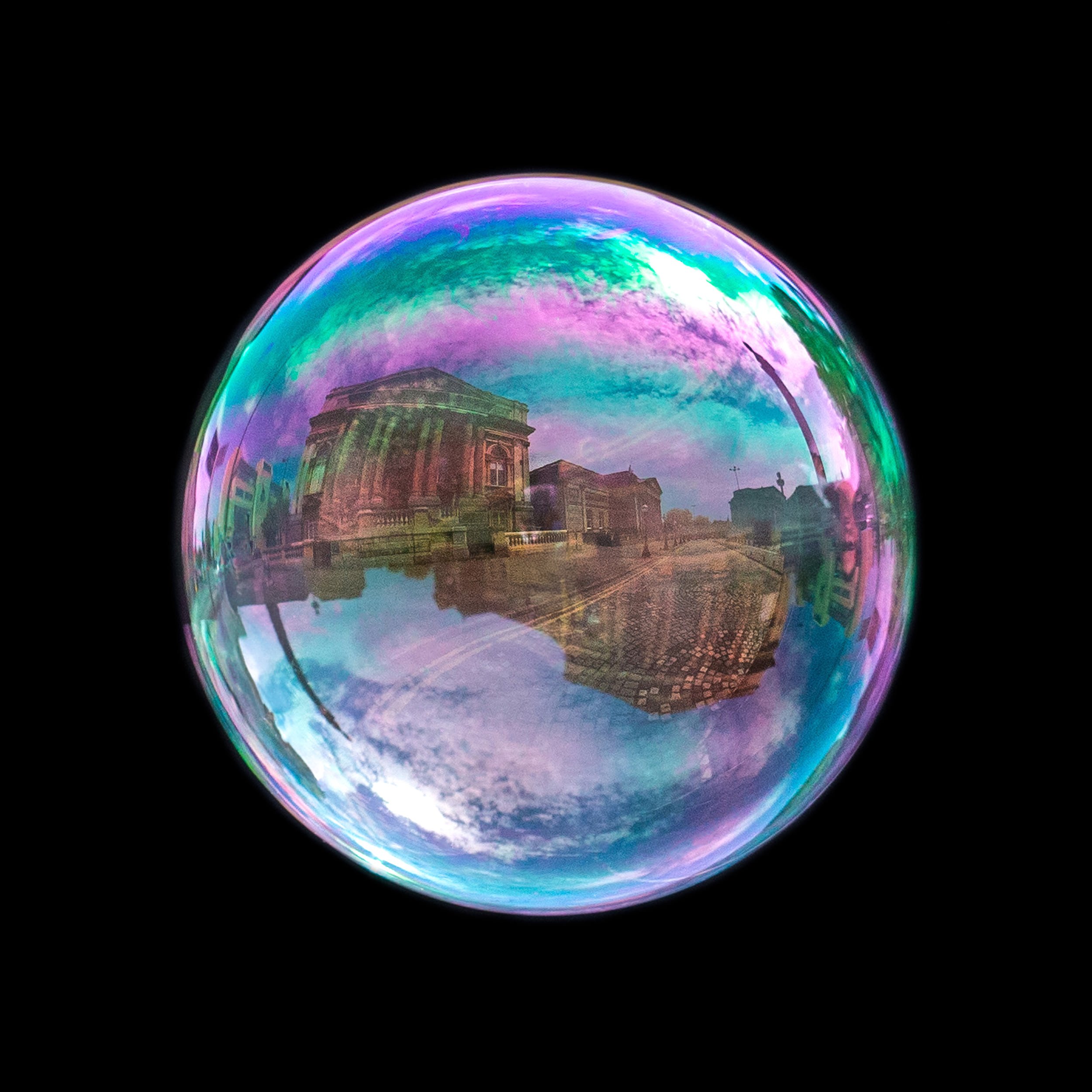 Fine art bubble photograph capturing liverpool inside a real soap bubble
