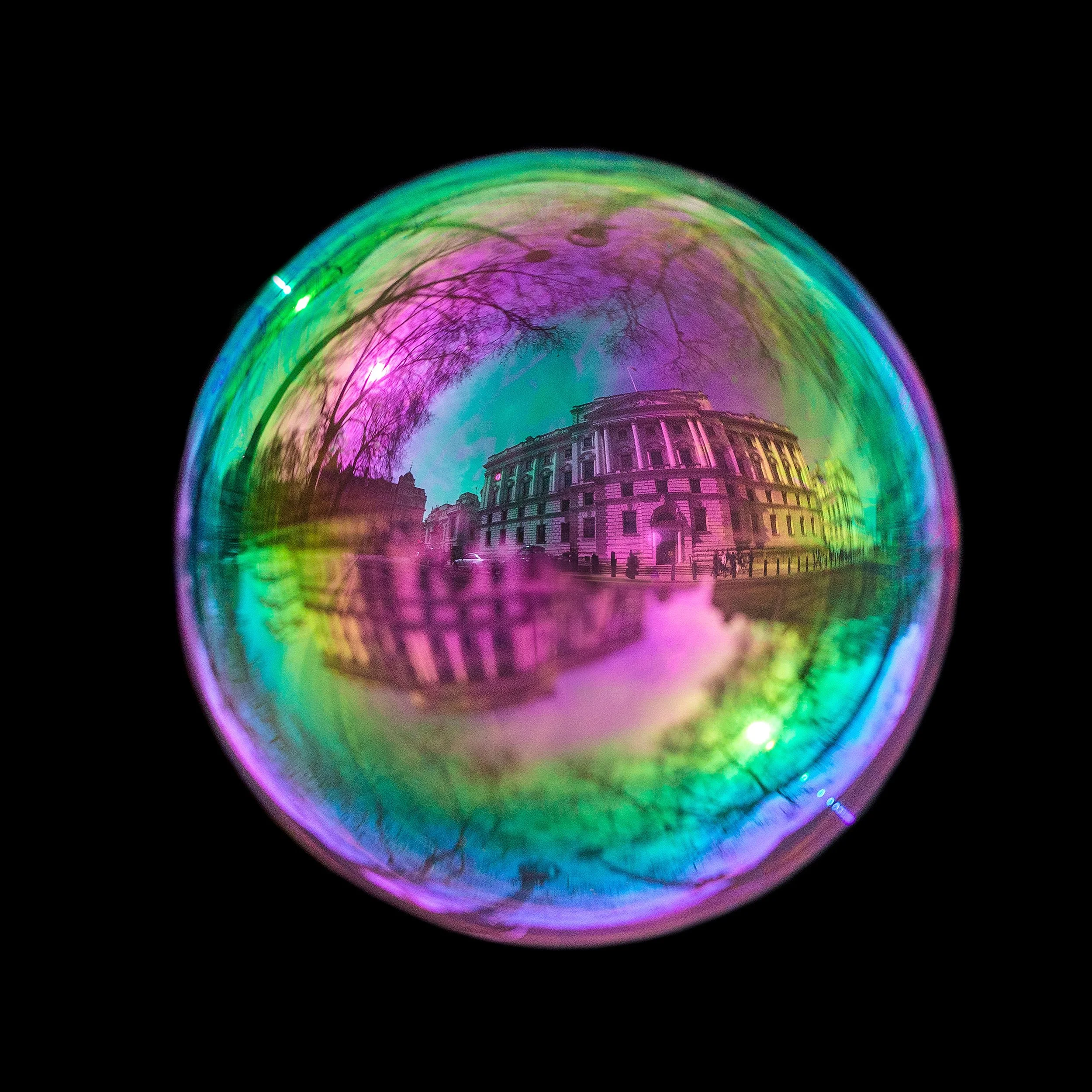 Fine art bubble photograph capturing hm treasury in London inside a real soap bubble
