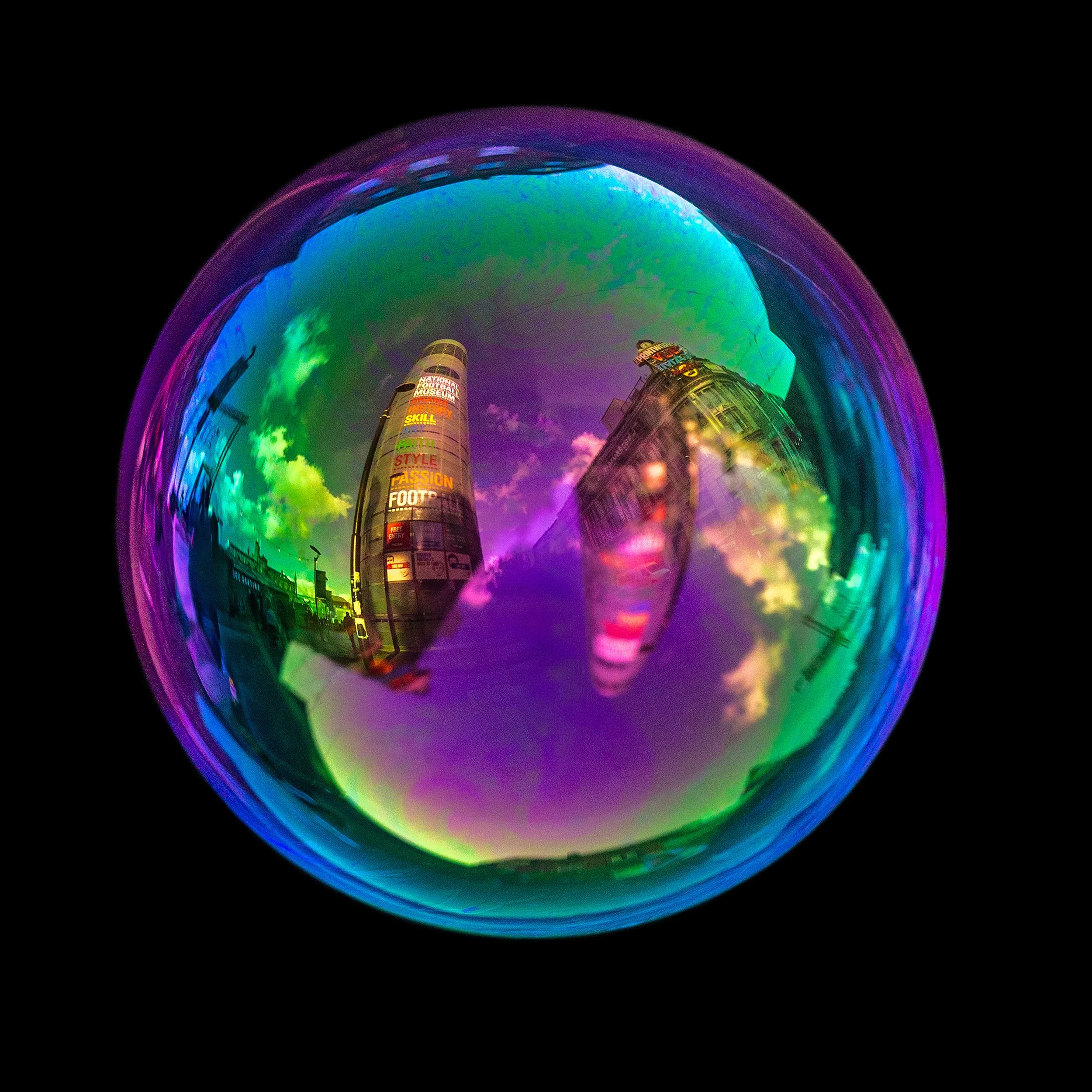 Fine art photograph of a real soap bubble reflecting urbis building in Manchester city centre