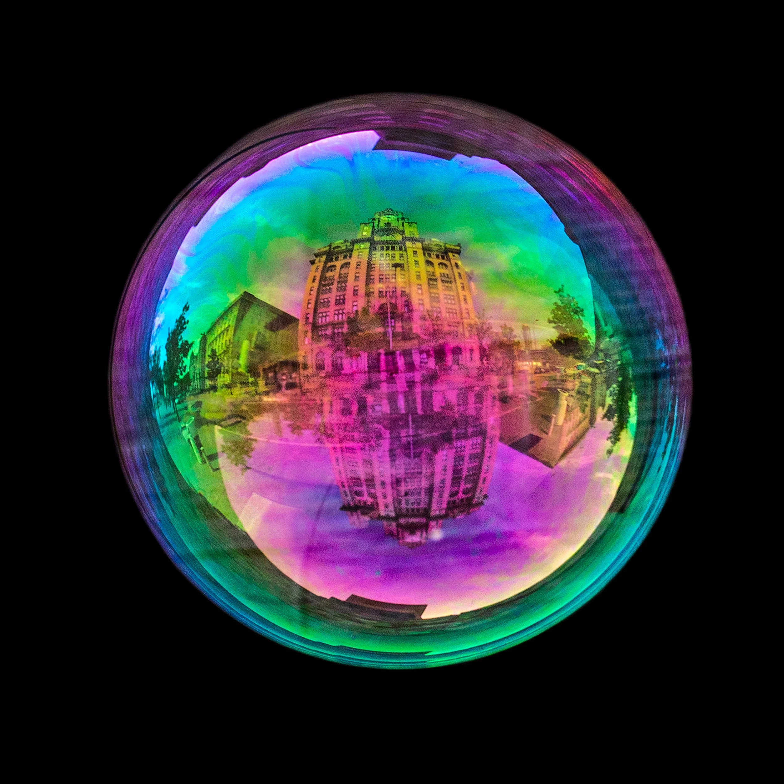 Fine art bubble photograph capturing liver building in liverpool inside a real soap bubble