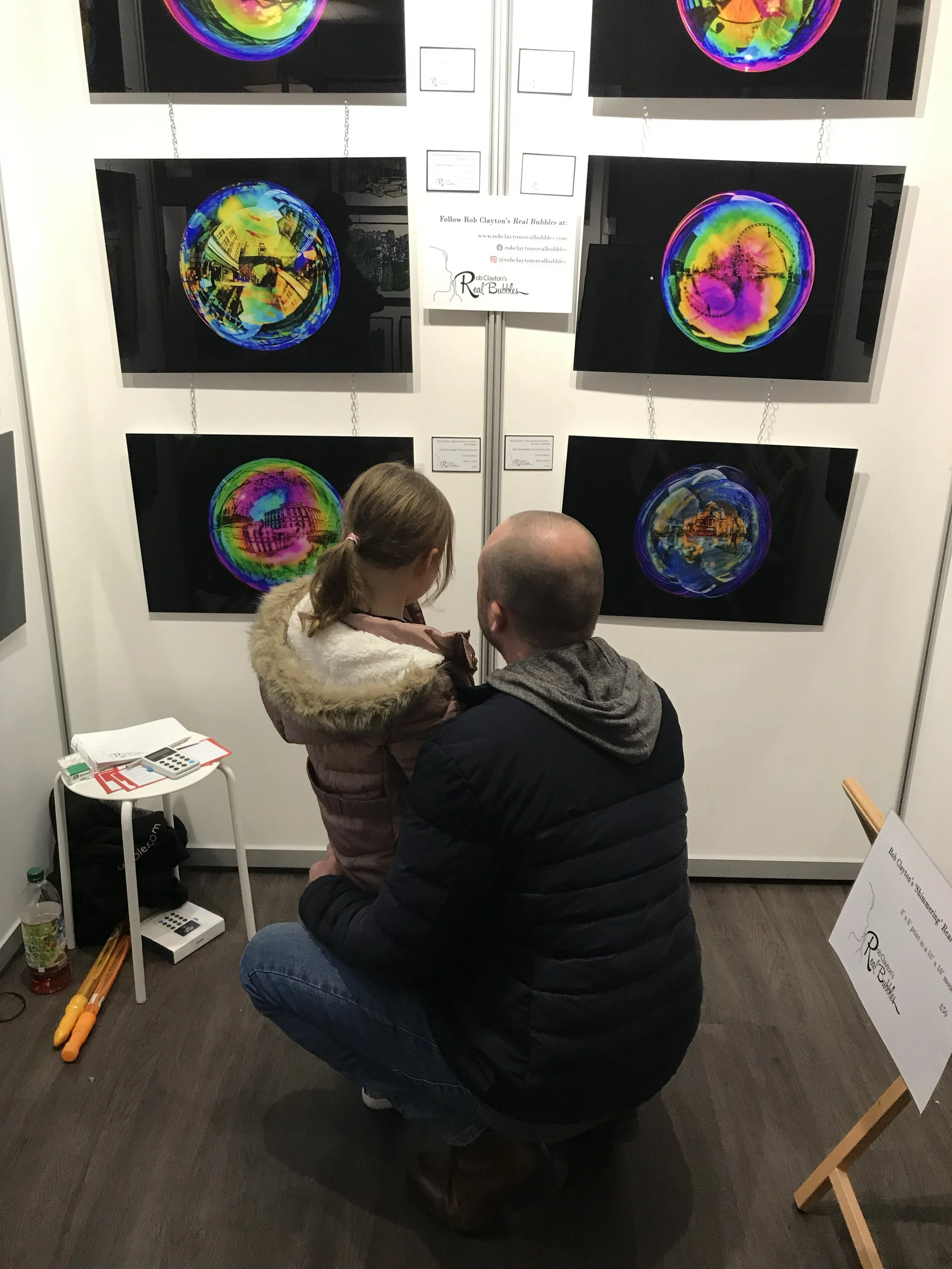 artist photographer rob clayton displays bubble photographs at art fair
