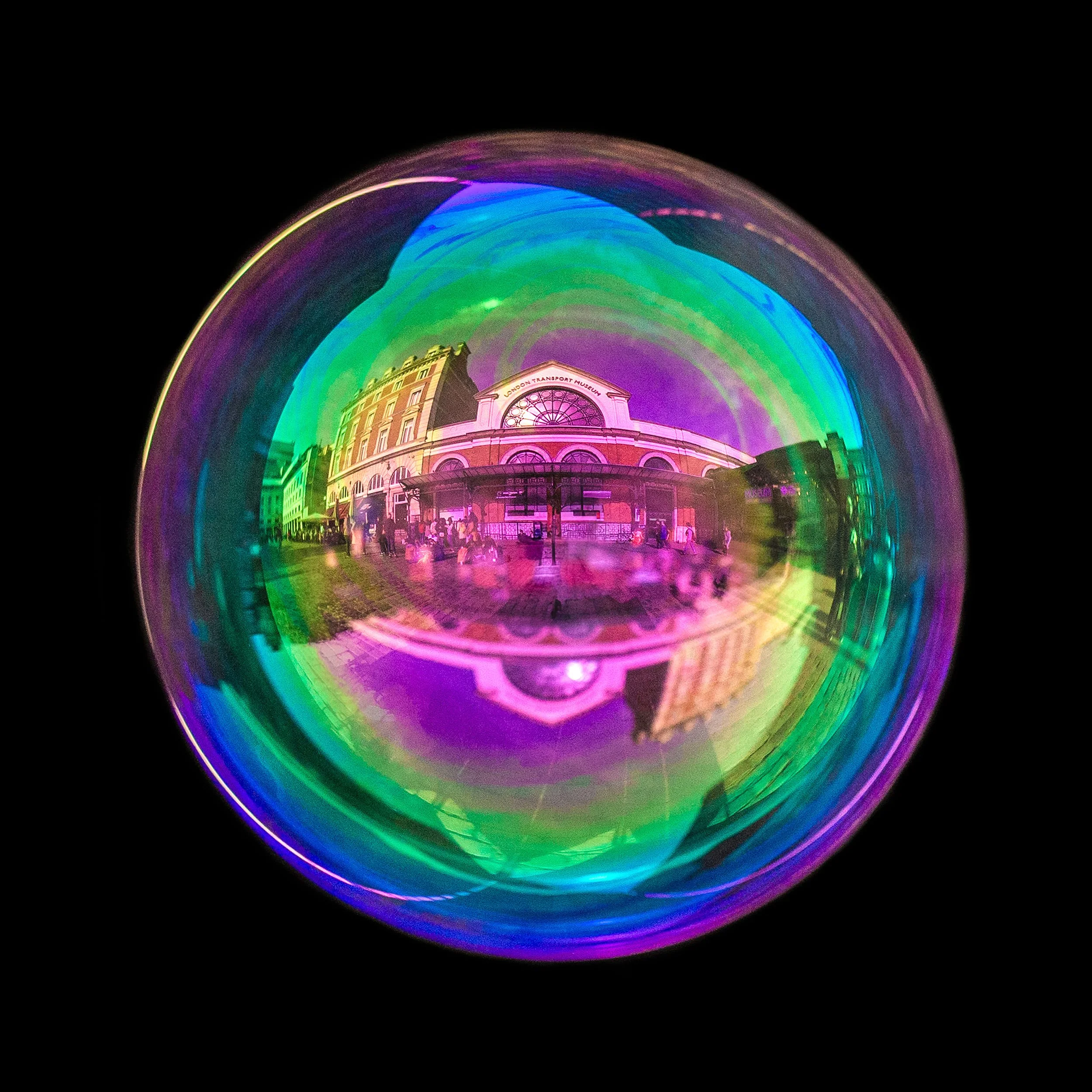 Real bubble photography featuring transport museum in London buildings and urban reflections