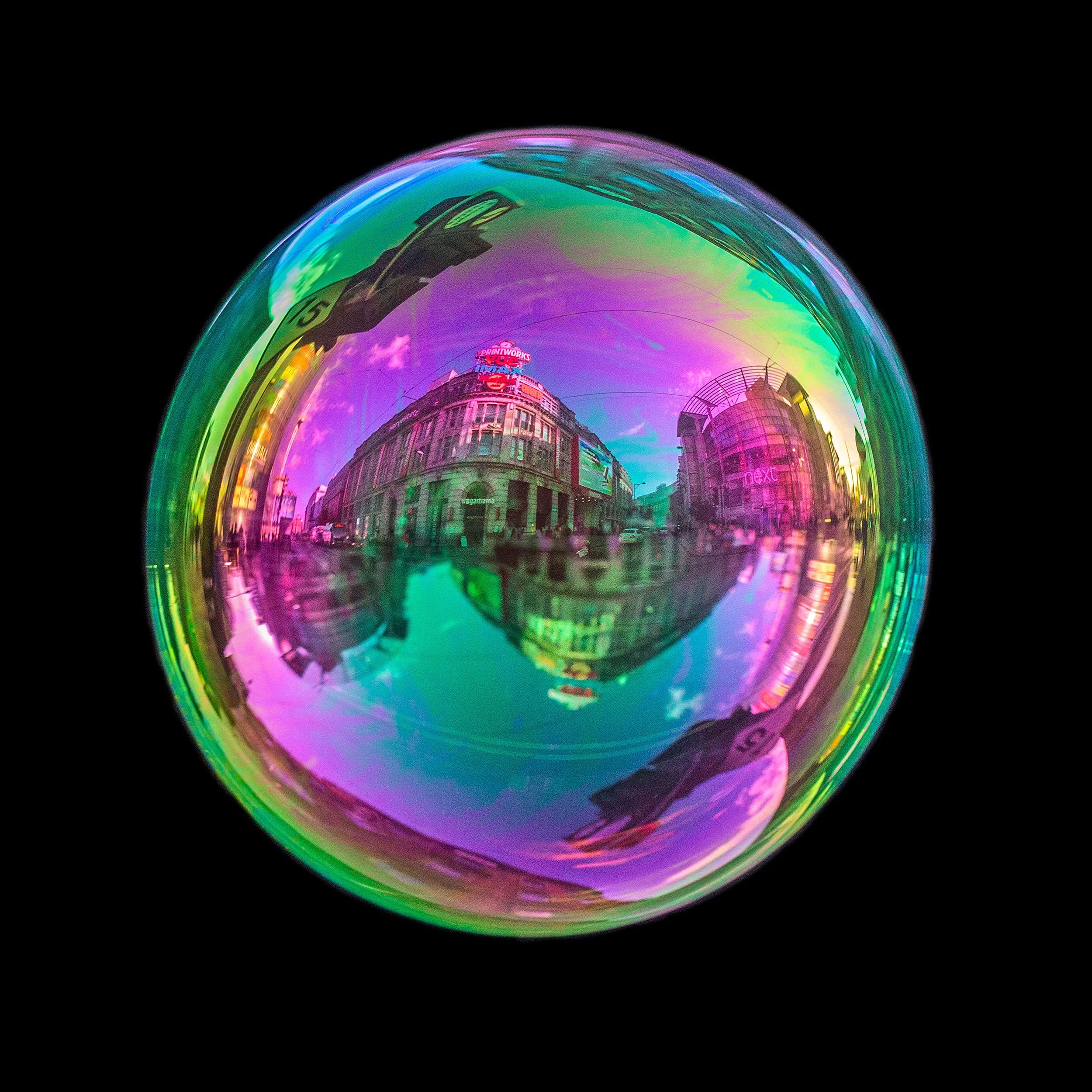 Fine art bubble photograph capturing manchester printworks inside a real soap bubble
