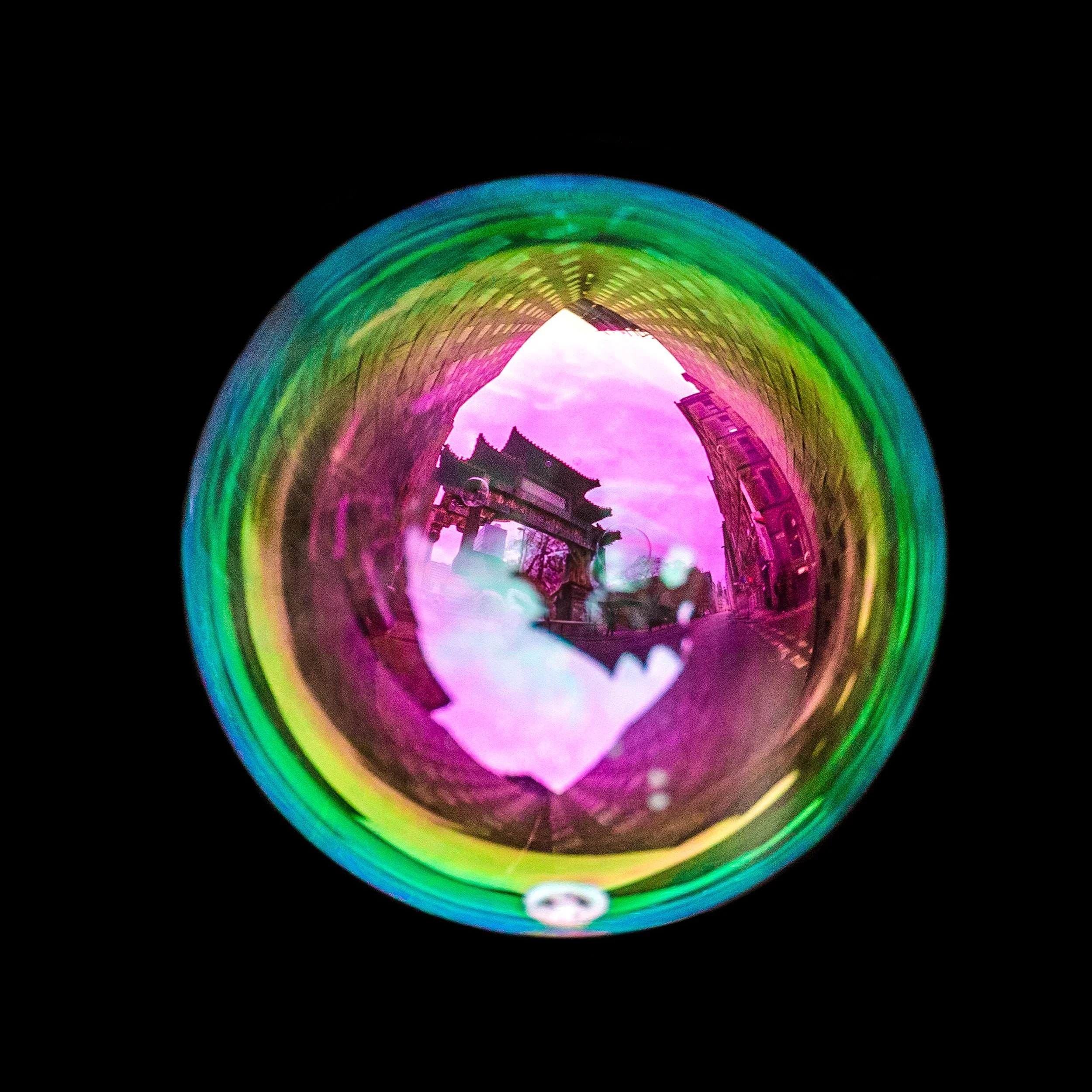 Real bubble photography artwork featuring reflections of china town arch archway in Manchester
