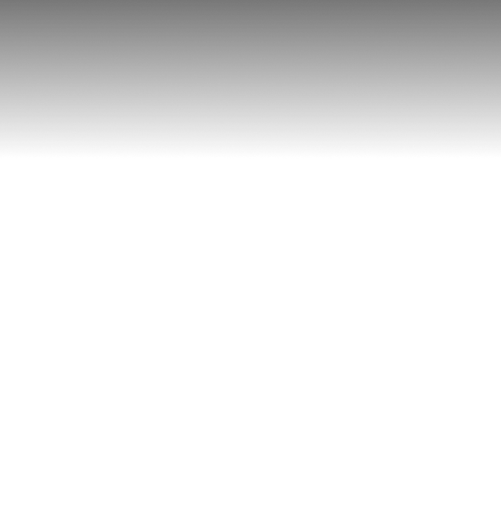 A vertical gradient transitioning smoothly from white on the left to dark gray on the right.