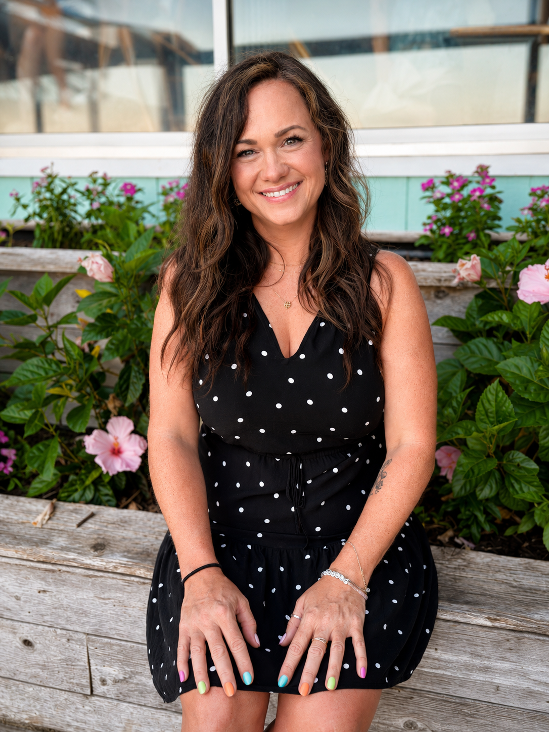 Portrait of Shel, writer, educator, and founder of Shine With Shel, smiling outdoors.