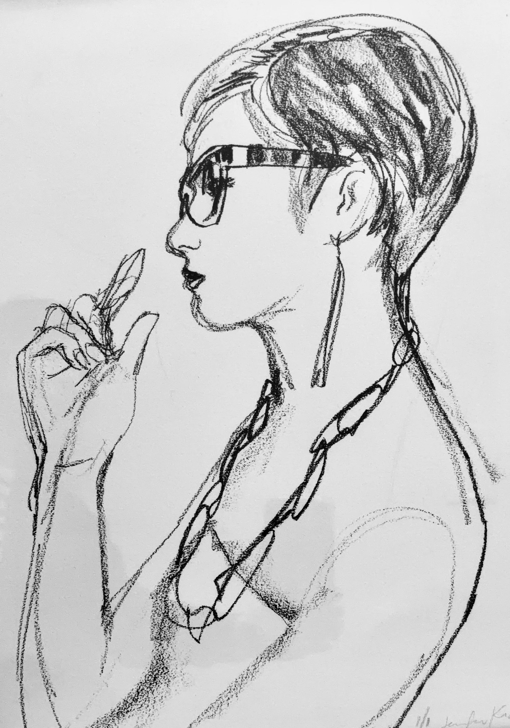 Black and white pencil sketch of a woman with short hair, wearing glasses, and holding a pen or pencil close to her face.