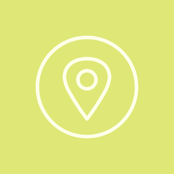 Icon of a location pin inside a circle on a light green background.