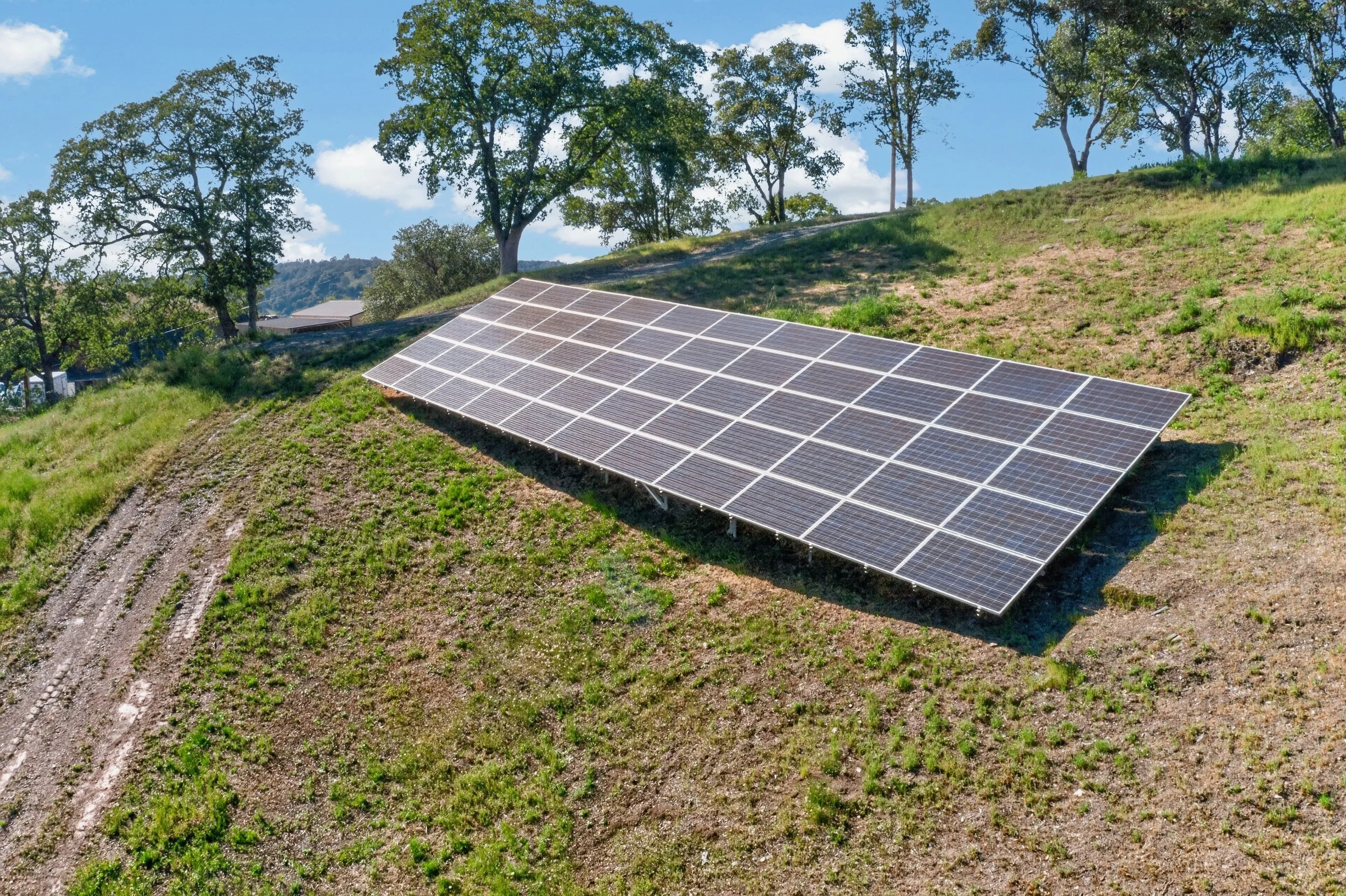 Ground-mounted solar power system at historic Airola Ranch in Vallecito California