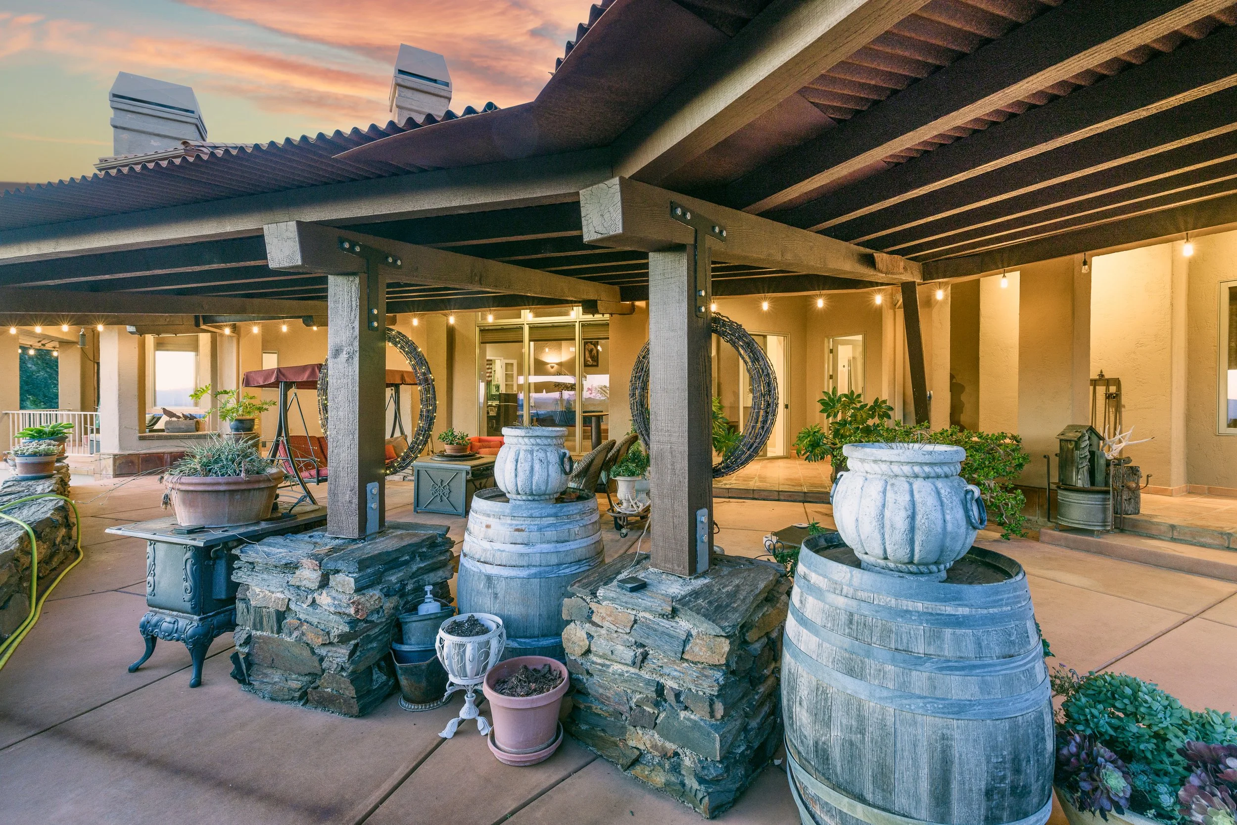A covered outdoor patio at sunset 7570 Airola Rd, Vallecito, CA