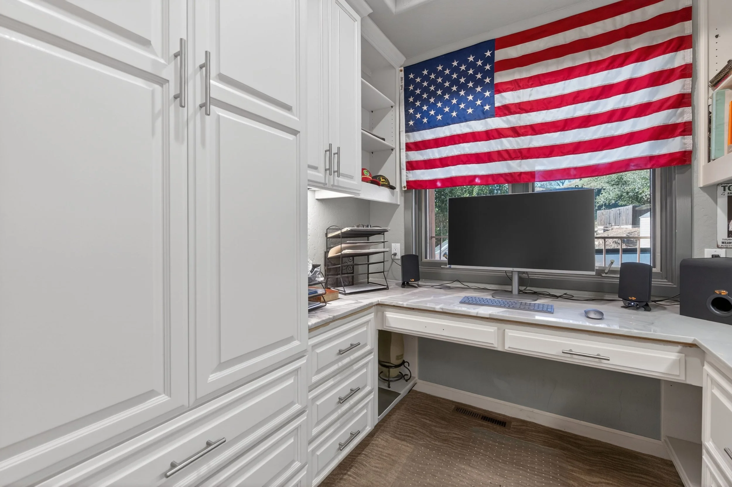 Private home office at Airola Ranch in Vallecito California featuring custom cabinetry, executive workspace design, and scenic Sierra Foothill living