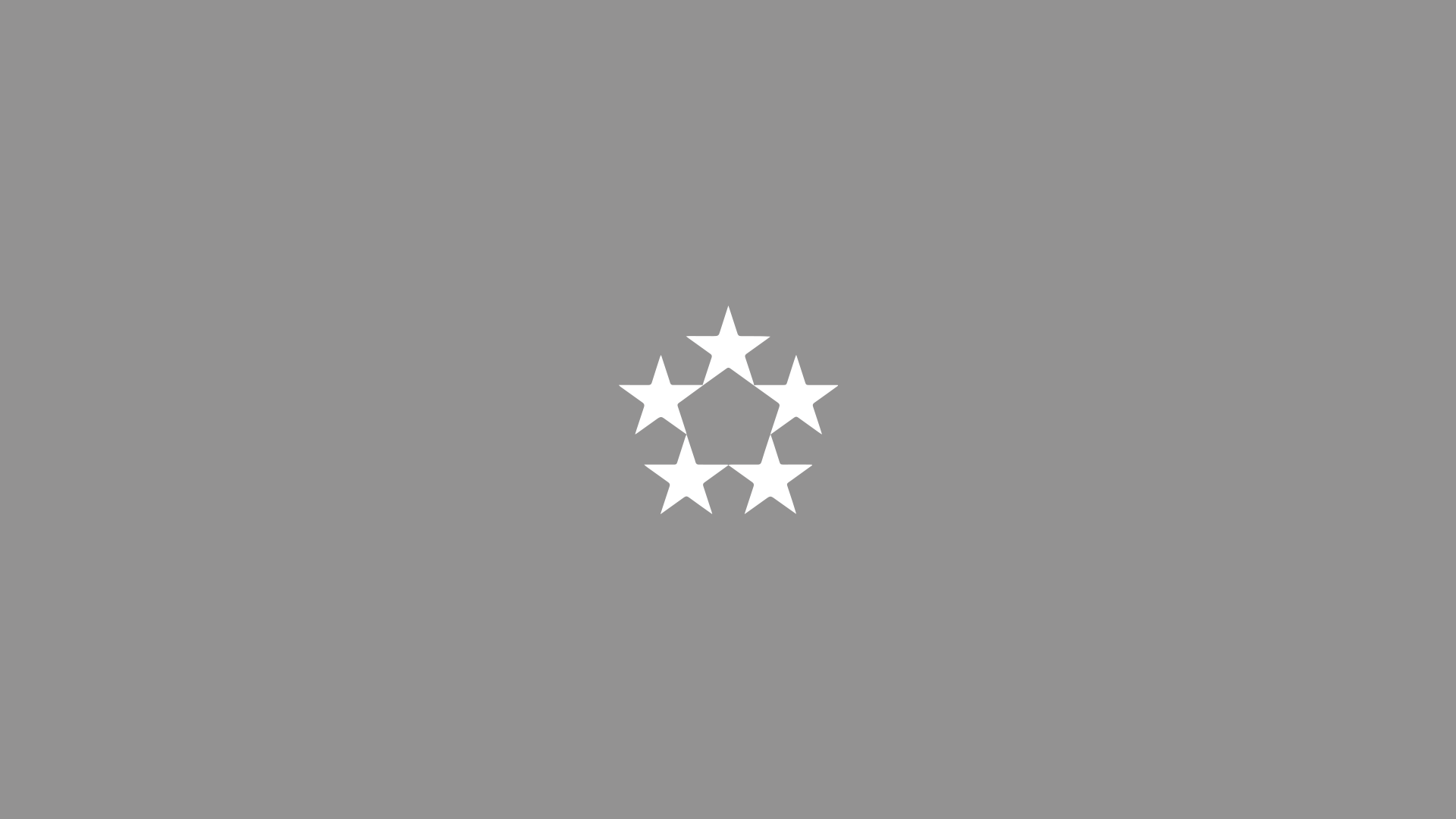 A gray background with a white circle of six stars surrounding a central pentagon.