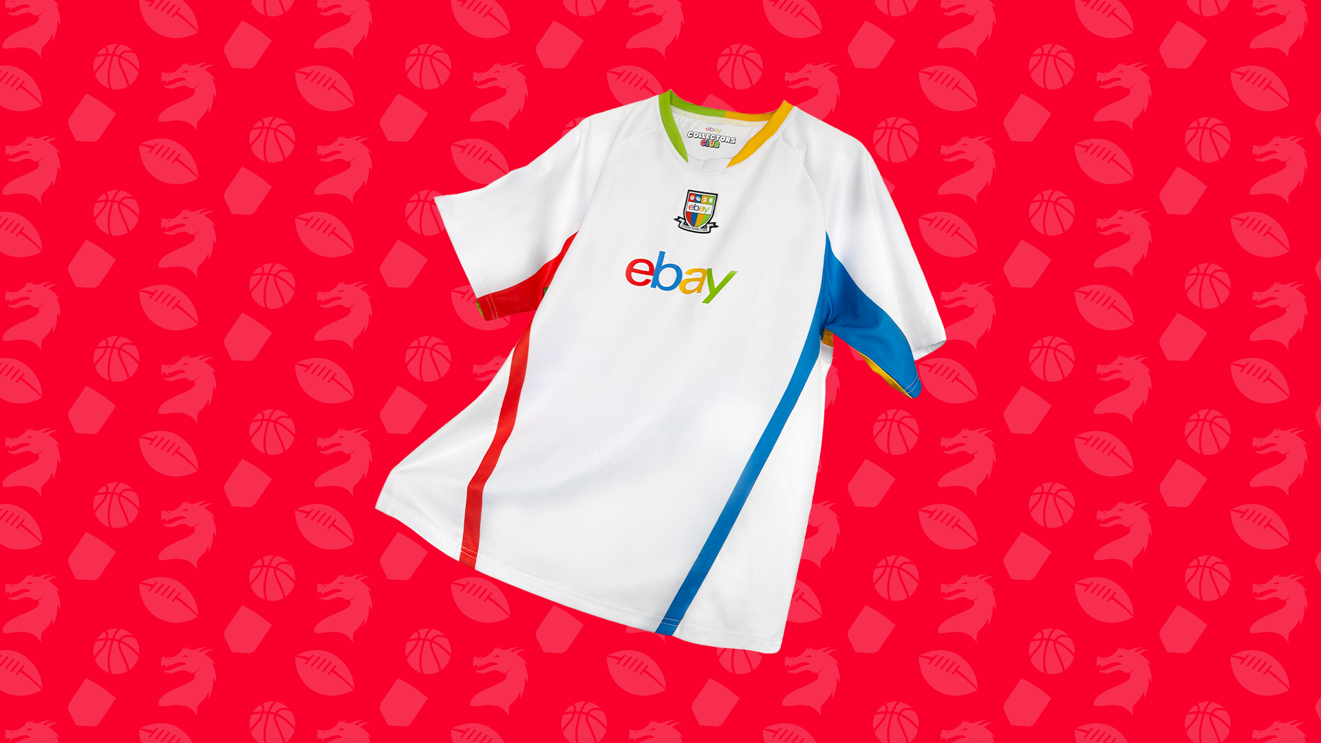 A white sports jersey with colorful accents, featuring the eBay logo, displayed against a red background with a pattern of sports balls and animal heads.