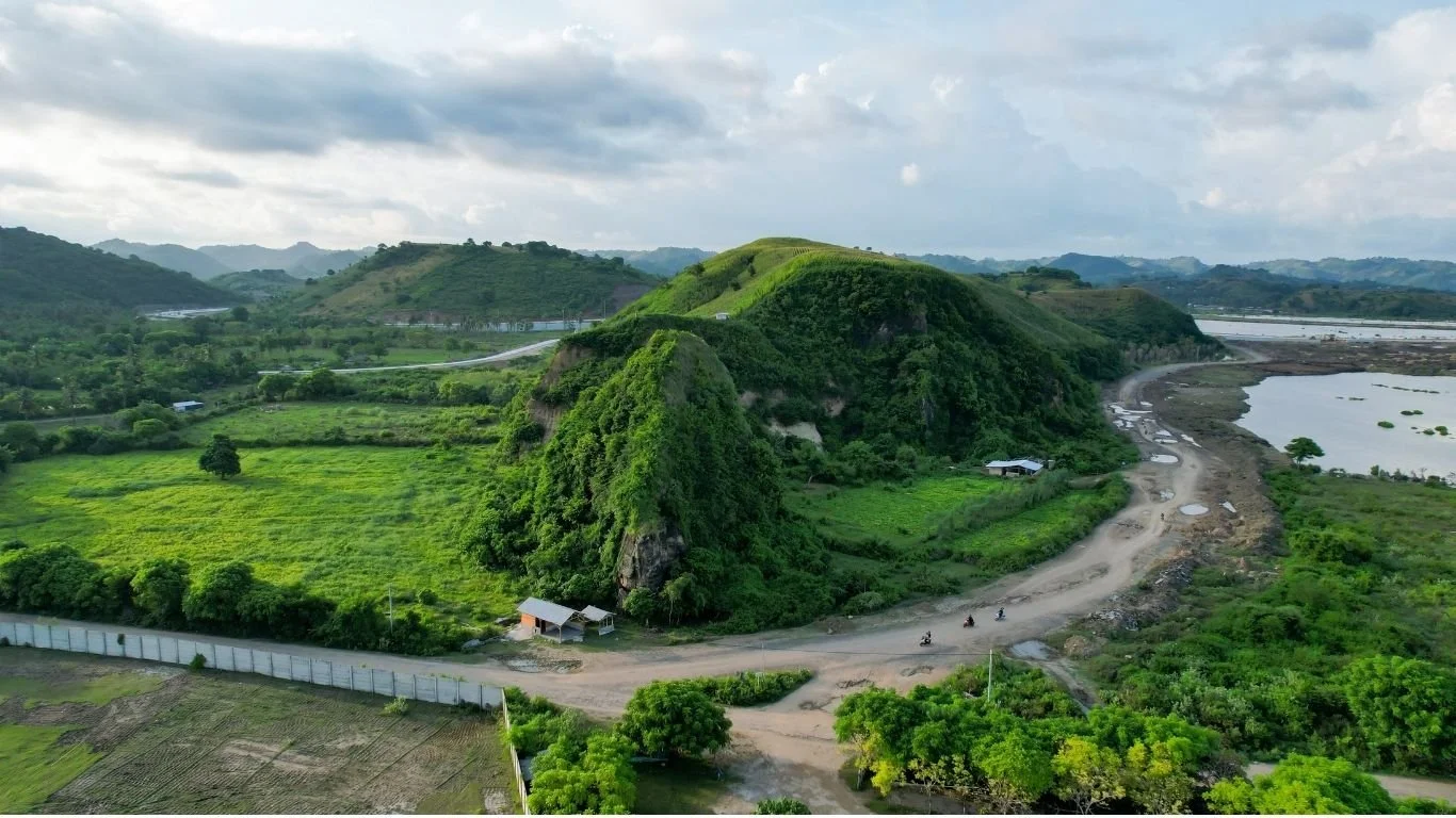 Scenic roads winding through the green hills of South Lombok near Kuta, where Google Maps doesn't always suggest the quickest or most direct route.