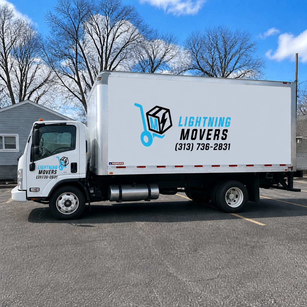 Commercial moving truck with Lightning Movers logo parked in parking lot on a partly cloudy day.