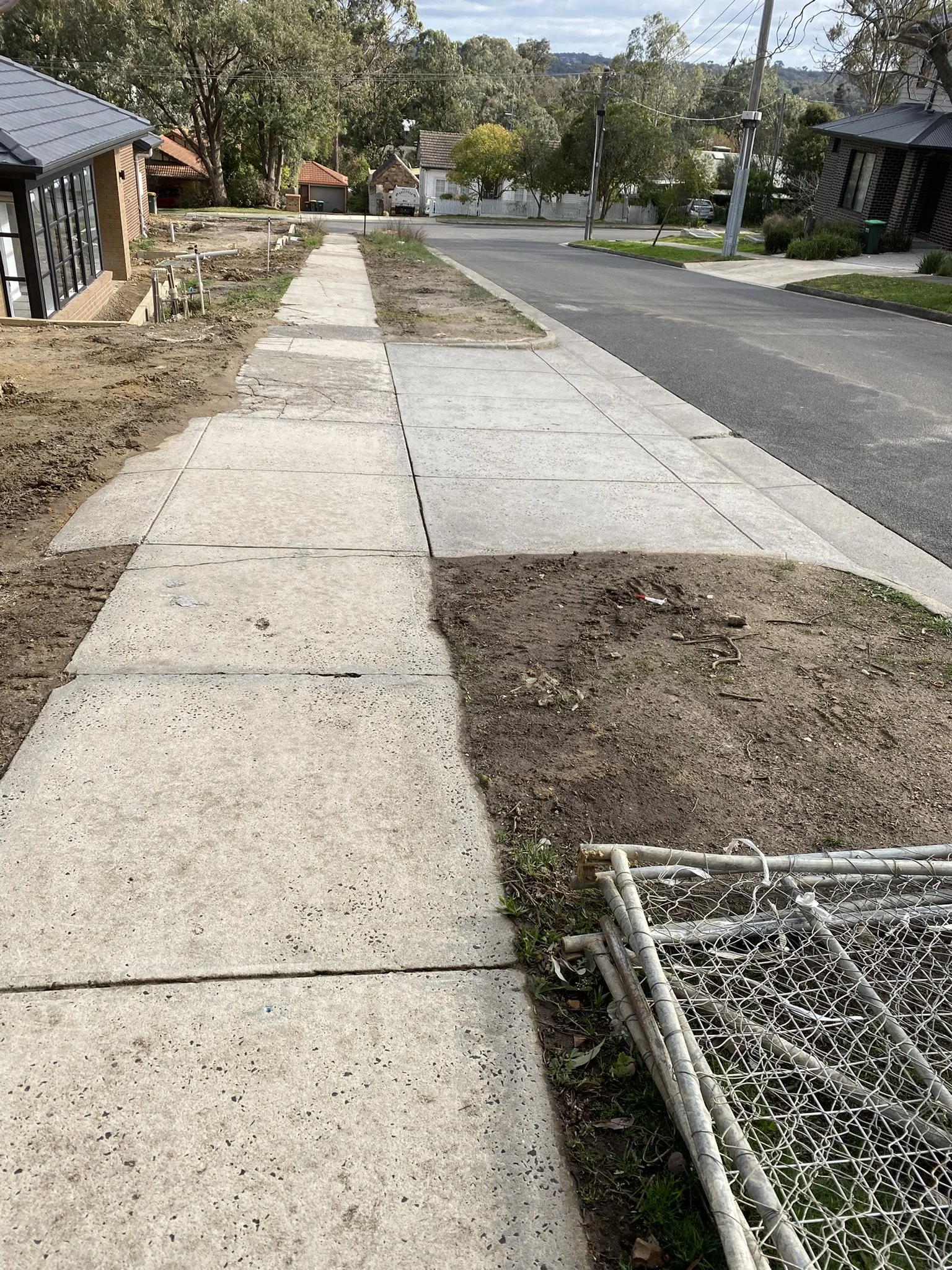 Concrete footpath in Templestowe after professional pressure cleaning, restored to a clean and bright finish.