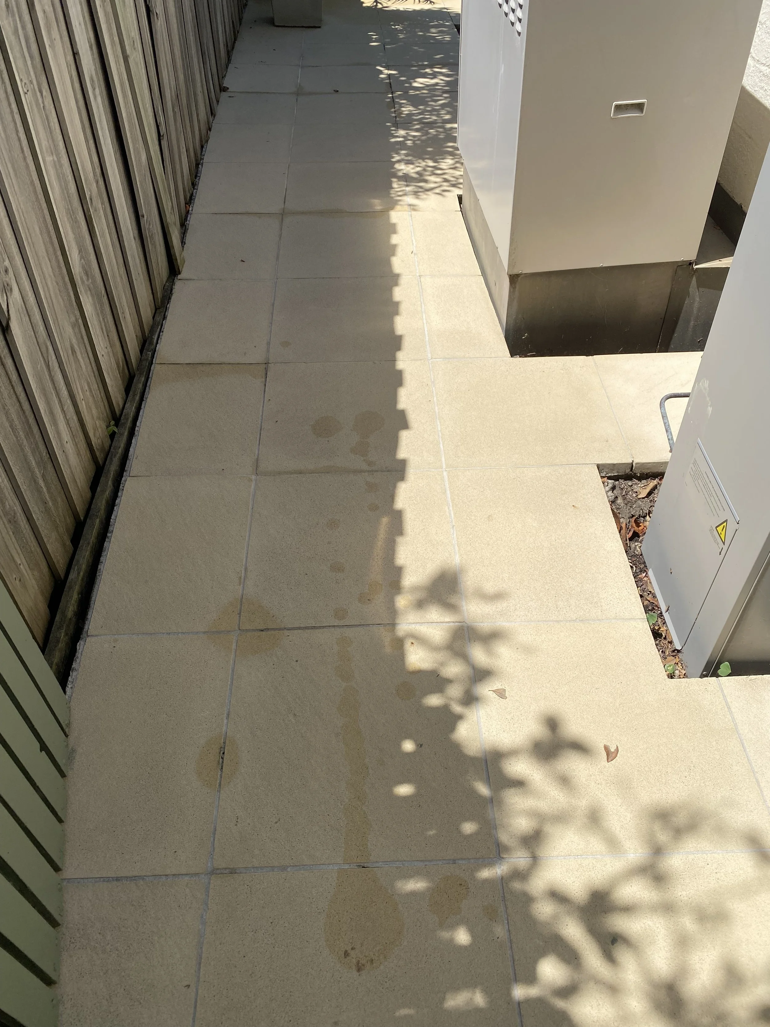 Outdoor tiled pathway in Templestowe after professional pressure cleaning, restored to a clean and fresh appearance.
