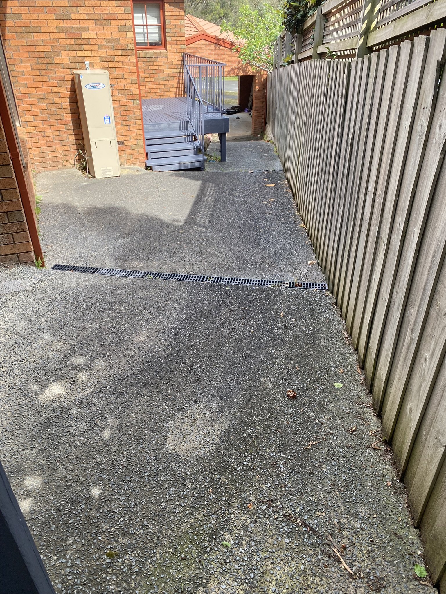 Weathered concrete path before pressure cleaning in Doncaster East