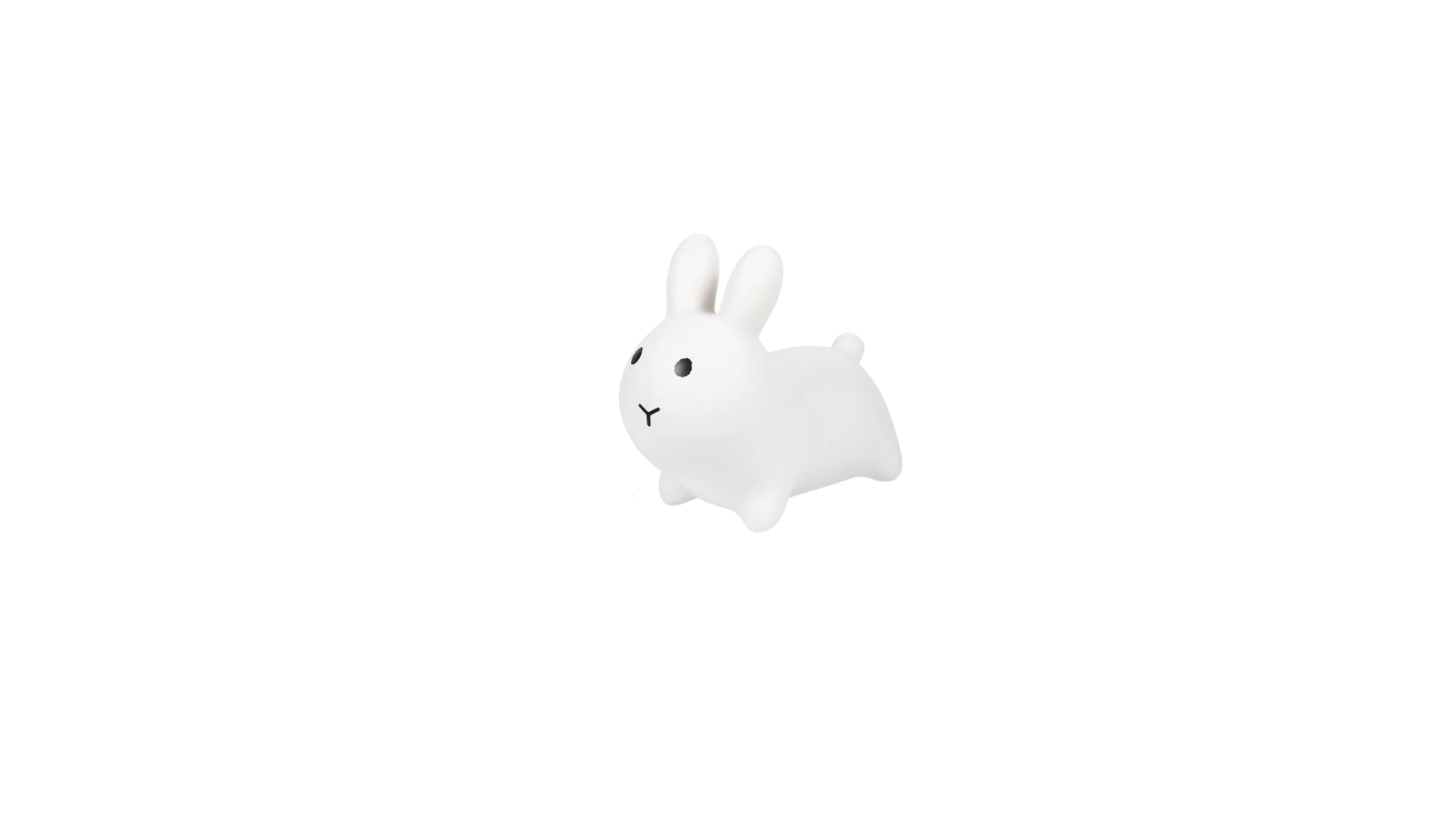 A white rabbit-shaped nightlight with black eyes and a small black nose, emitting a soft light