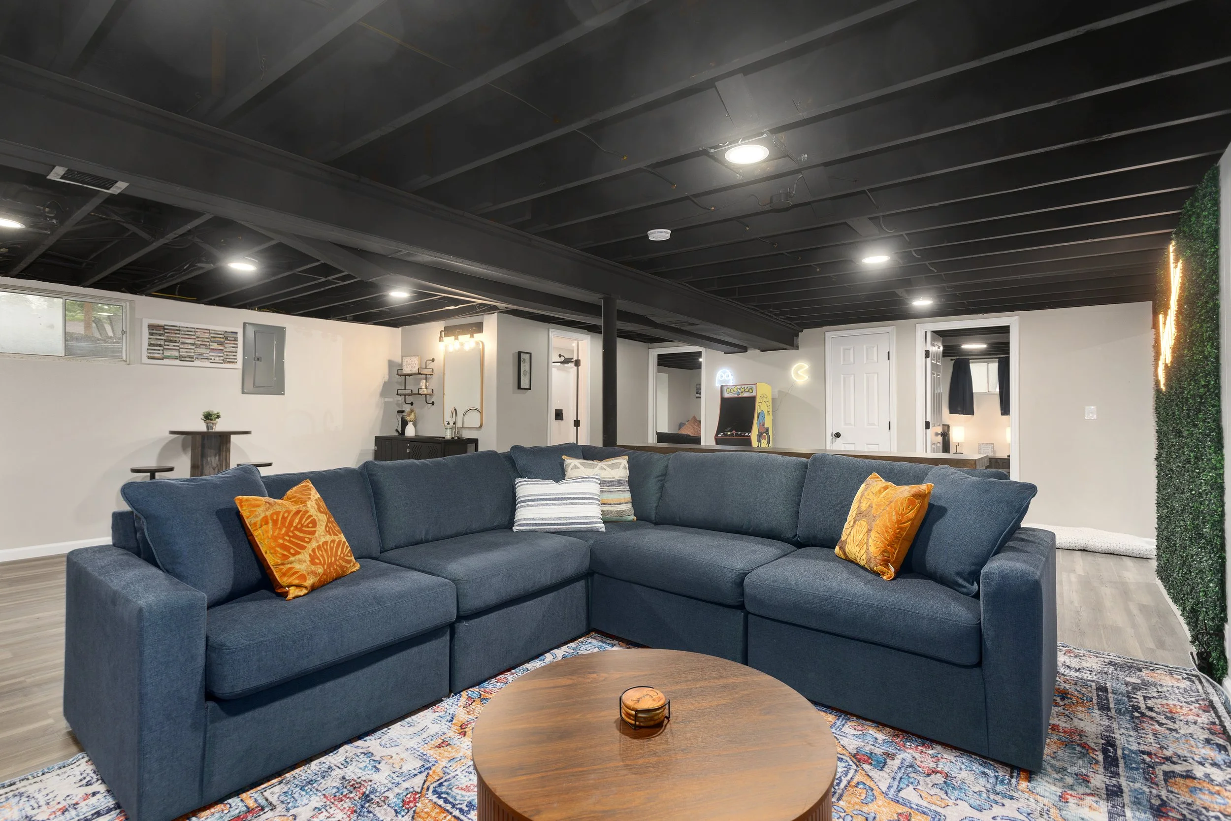 Warm community lounge at Fountain City Creative Retreat featuring comfortable sectional seating, gathering space, and room for creative groups to relax, reconnect, and enjoy meaningful retreat weekends near Kansas City.
