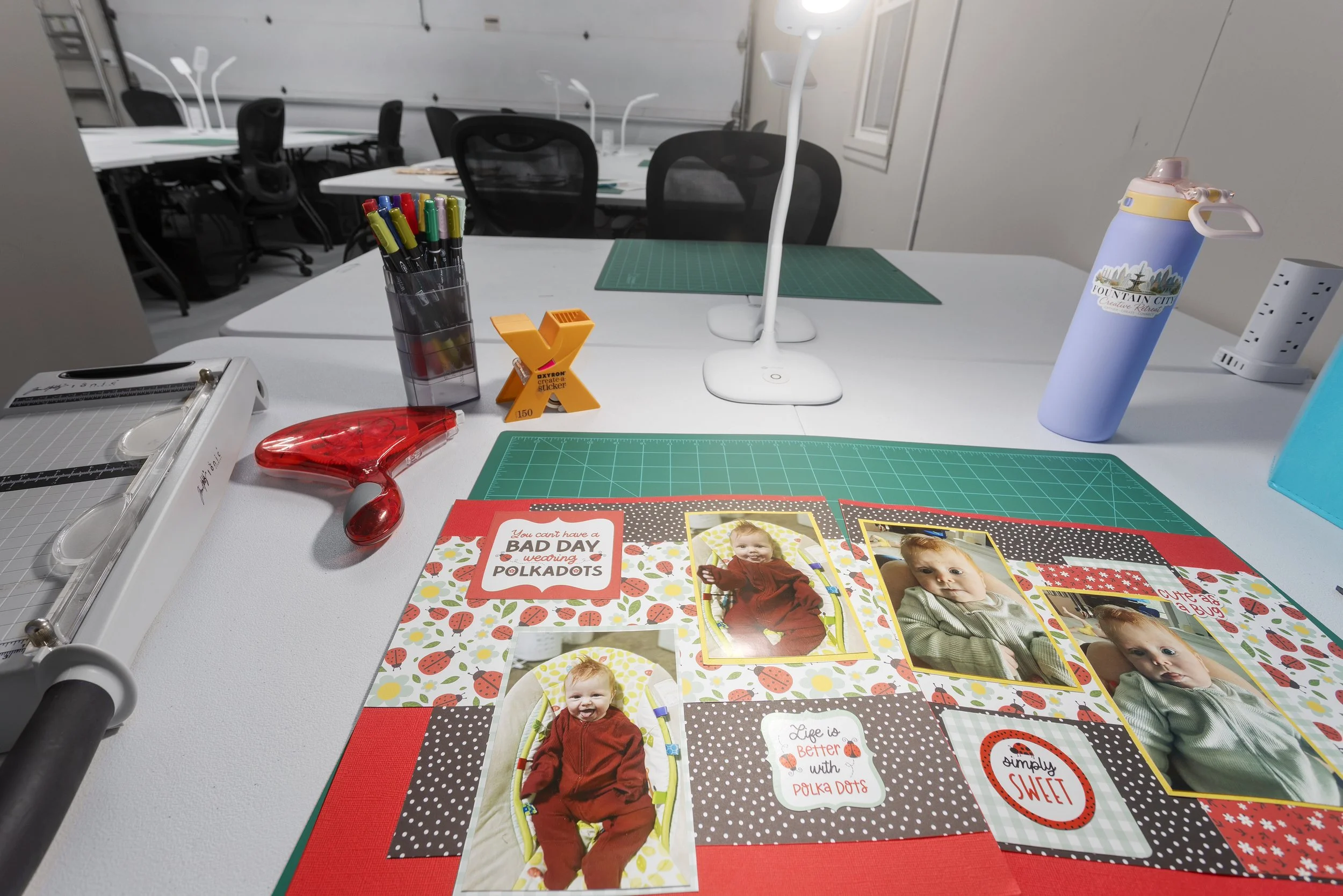 Dedicated creative workstation at Fountain City Creative Retreat designed for scrapbookers, quilters, and makers, featuring spacious personal work areas, task lighting, and room to spread out projects during creative retreat weekends near Kansas City