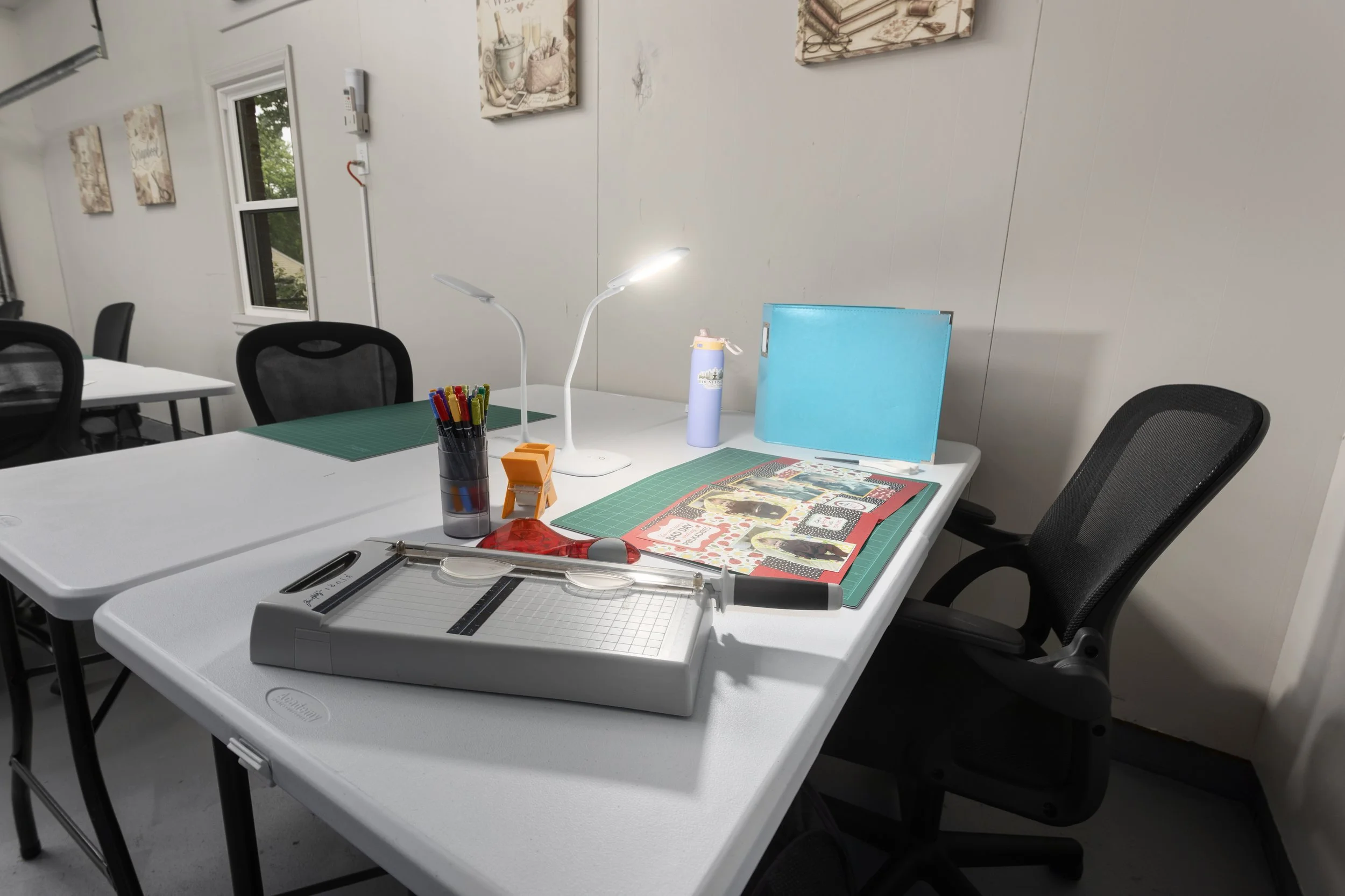 Purpose-built creative workstation at Fountain City Creative Retreat designed for scrapbookers, quilters, and makers, featuring dedicated workspace, task lighting, comfortable seating, and room to create comfortably all weekend long near Kansas City.