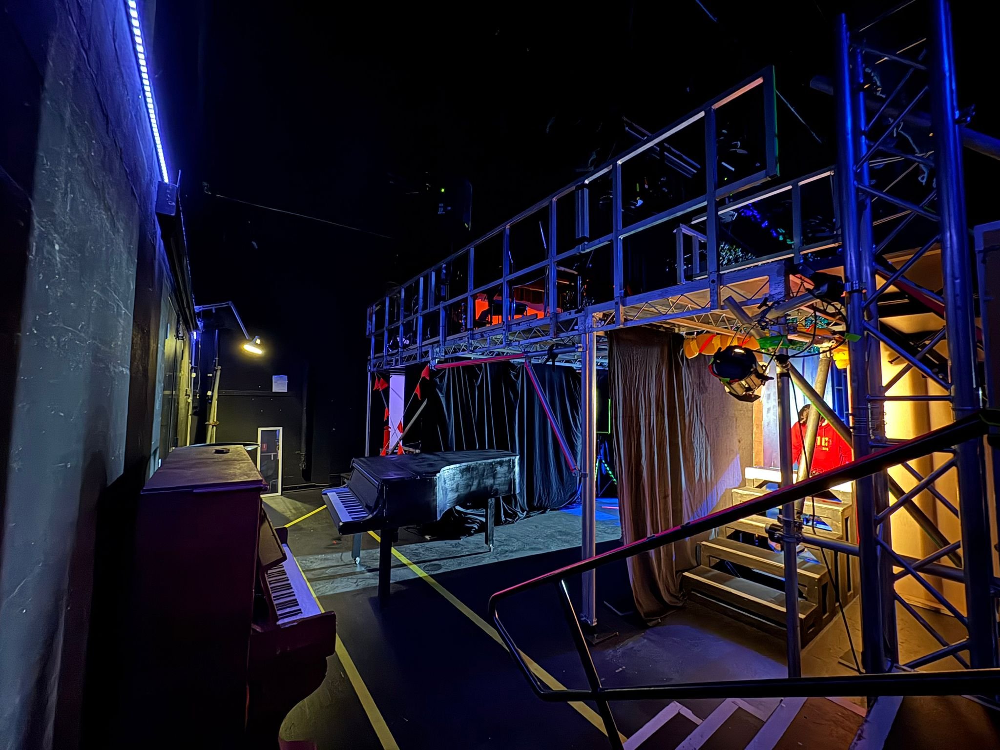 Gilbert and Sullivan Society's production of Merrily We Roll Along features 26 headsets and a 12-chair orchestra, including keys, bass, and percussion, managed by Charlie on Front of House Audio.